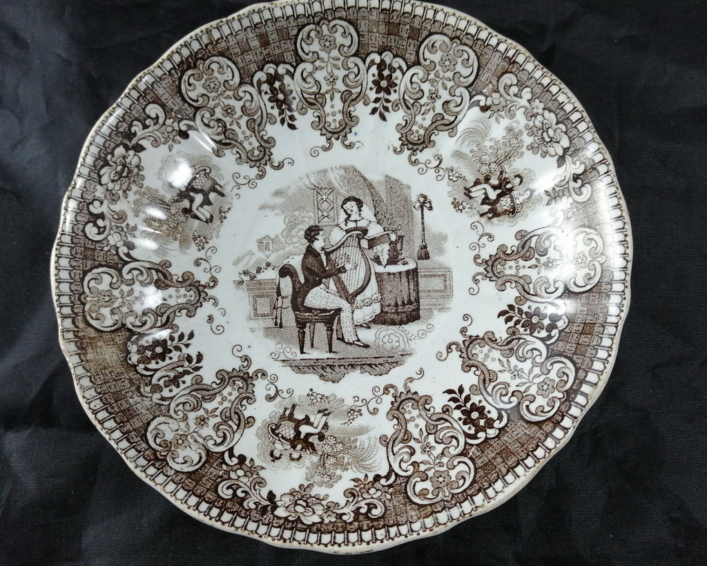 Empire Porcelain Teacup and Saucer, transfer-printer, Victorian motifs