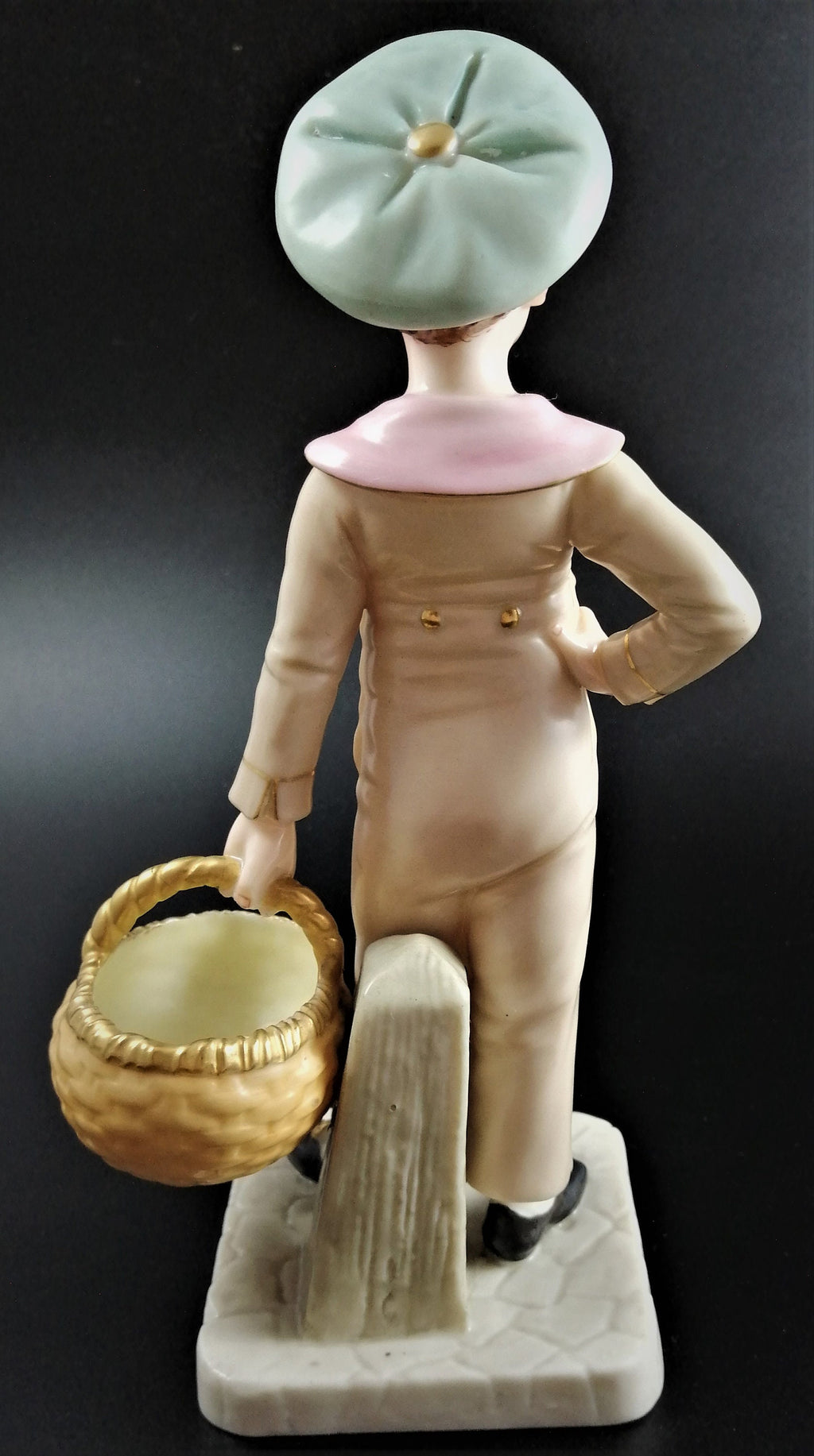 Antique Royal Worcester,boy with basket,modelled by James Hadley.