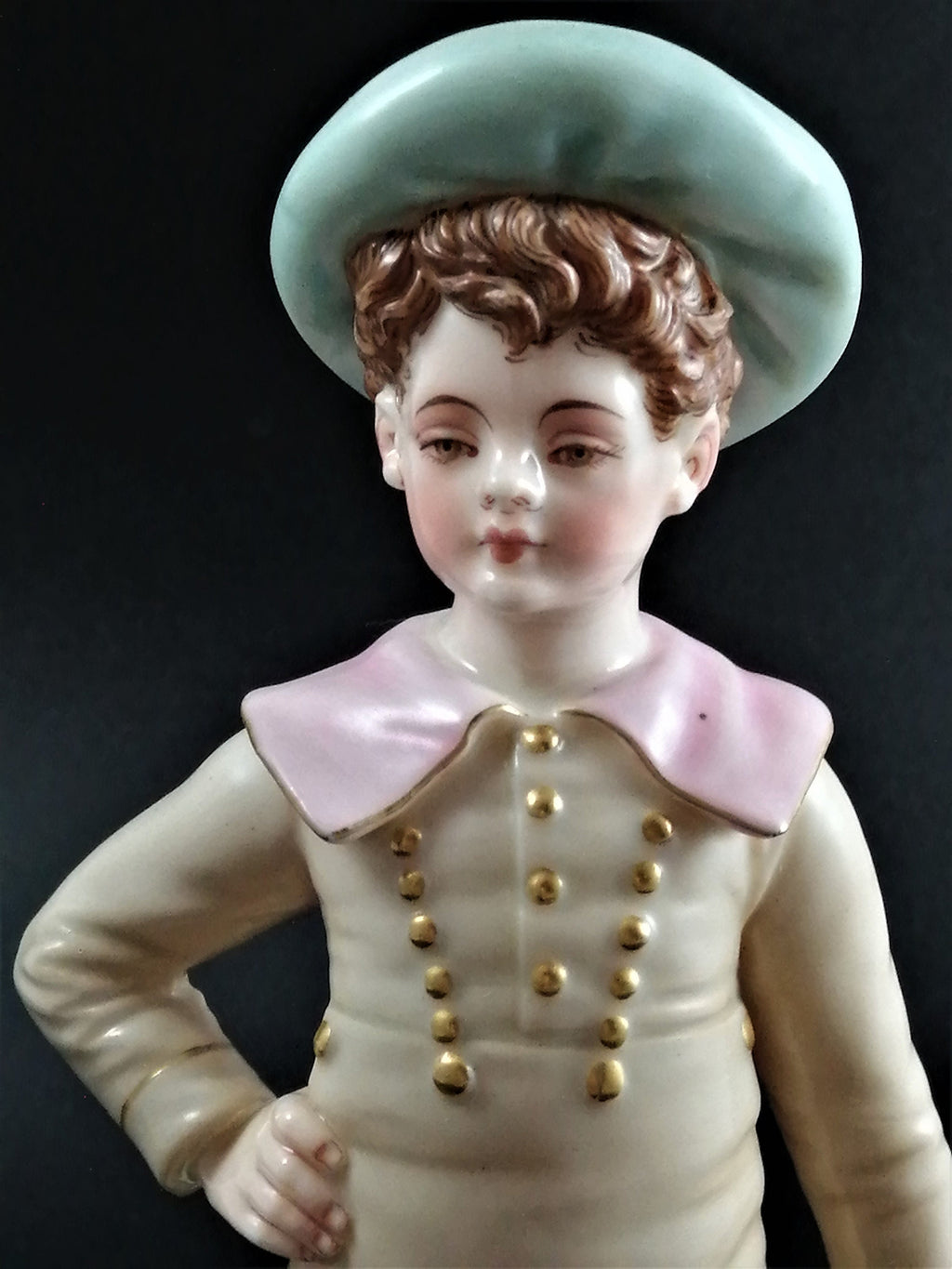 Antique Royal Worcester,boy with basket,modelled by James Hadley.