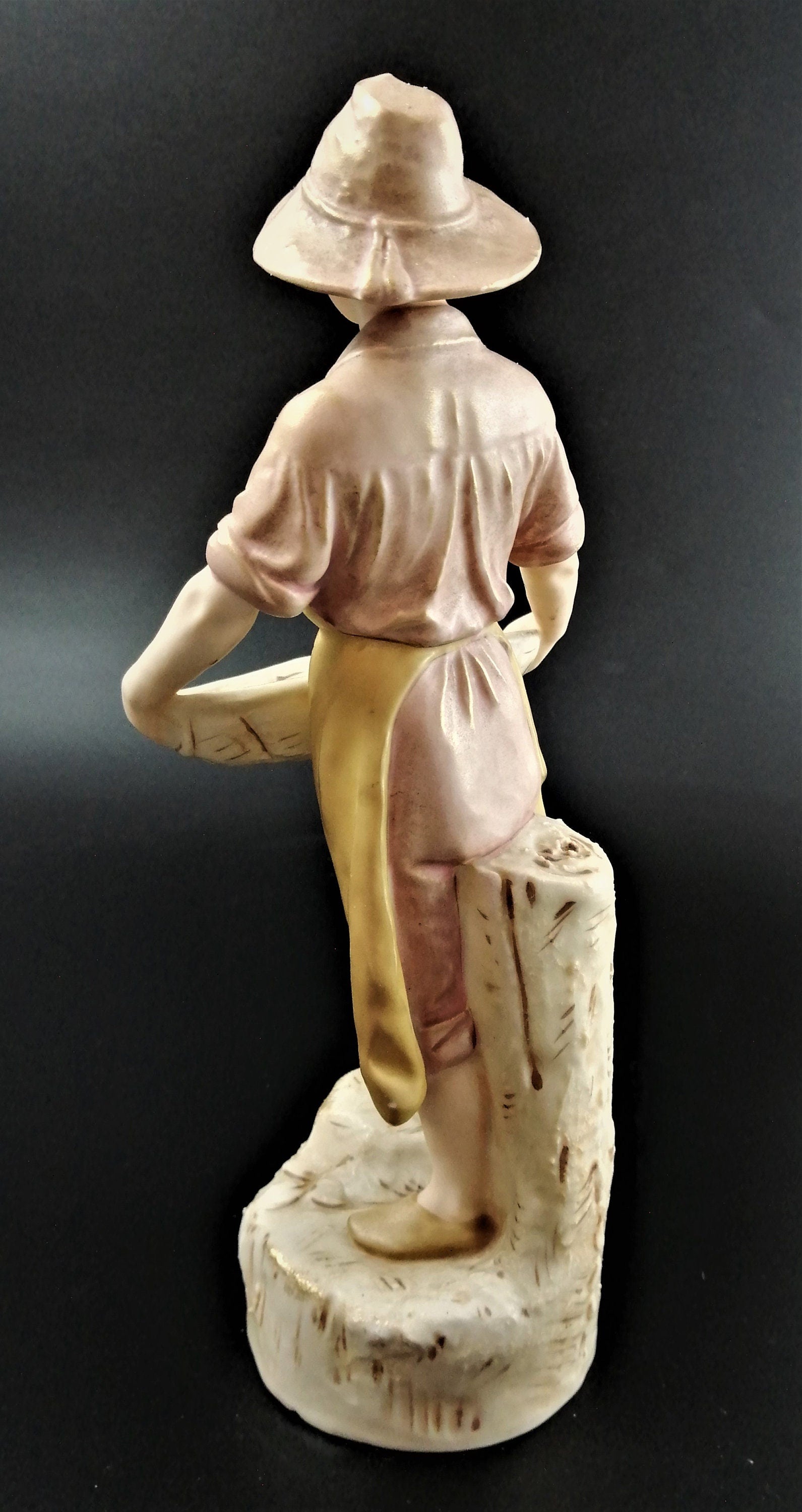 Antique Royal Dux Porcelain Figurine of young man carrying gathering baskets