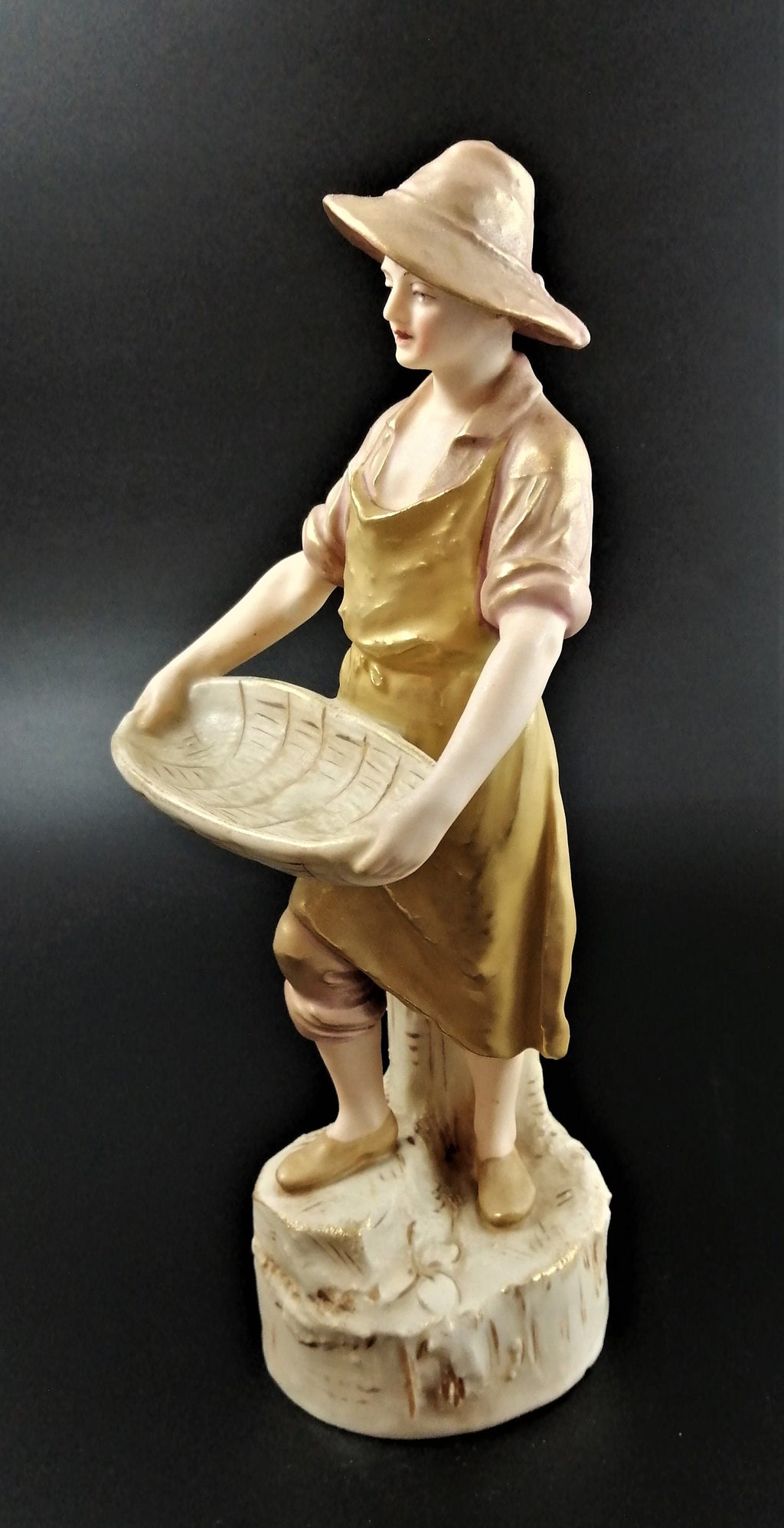 Antique Royal Dux Porcelain Figurine of young man carrying gathering baskets