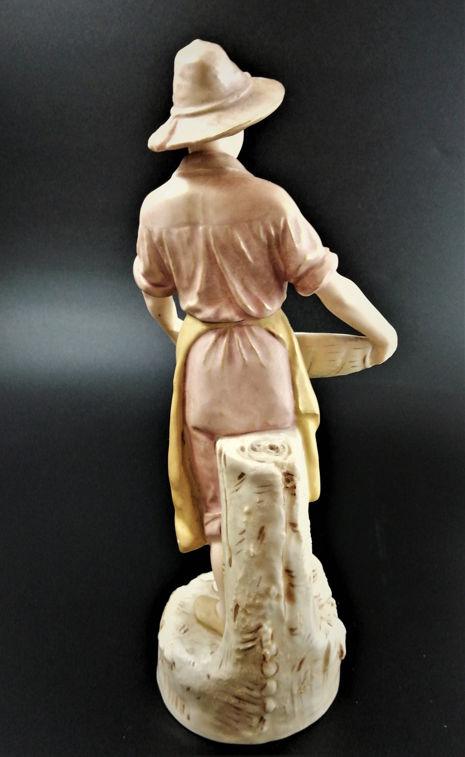 Antique Royal Dux Porcelain Figurine of young man carrying gathering baskets