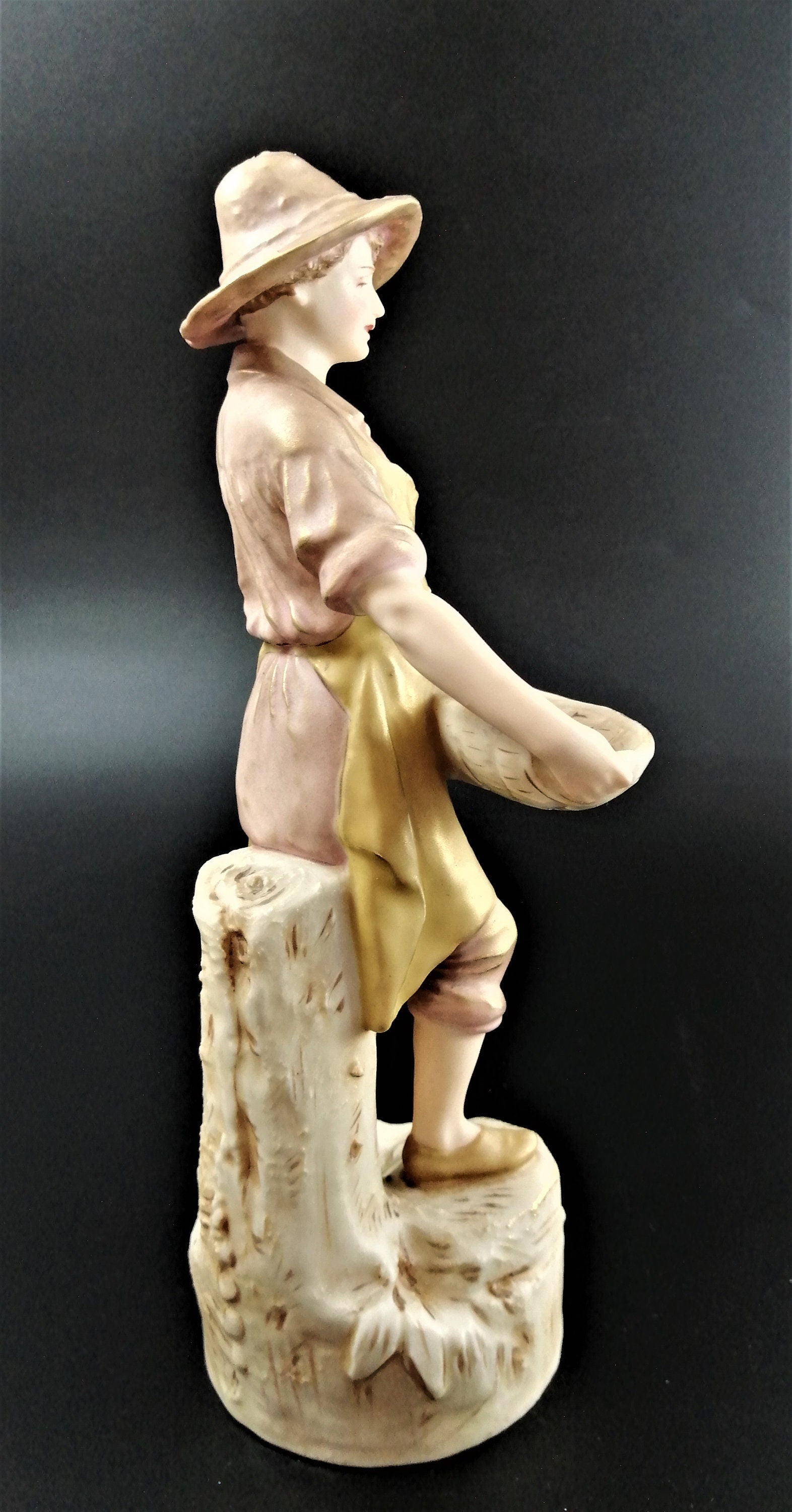 Antique Royal Dux Porcelain Figurine of young man carrying gathering baskets