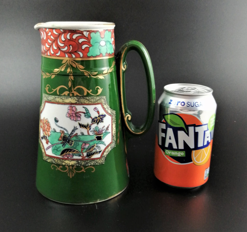 Rare antique Ashworth's Ironstone jug in the "Trophies" pattern