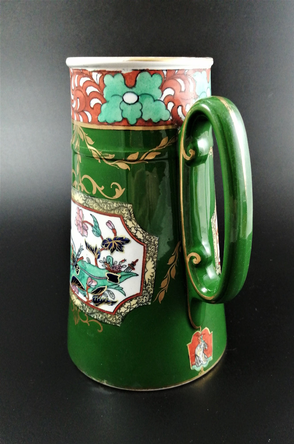 Rare antique Ashworth's Ironstone jug in the "Trophies" pattern