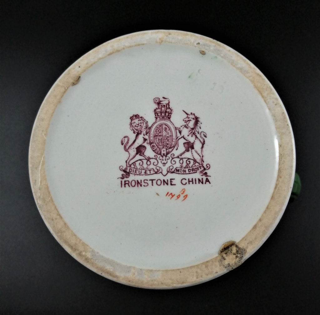 Rare antique Ashworth's Ironstone jug in the "Trophies" pattern