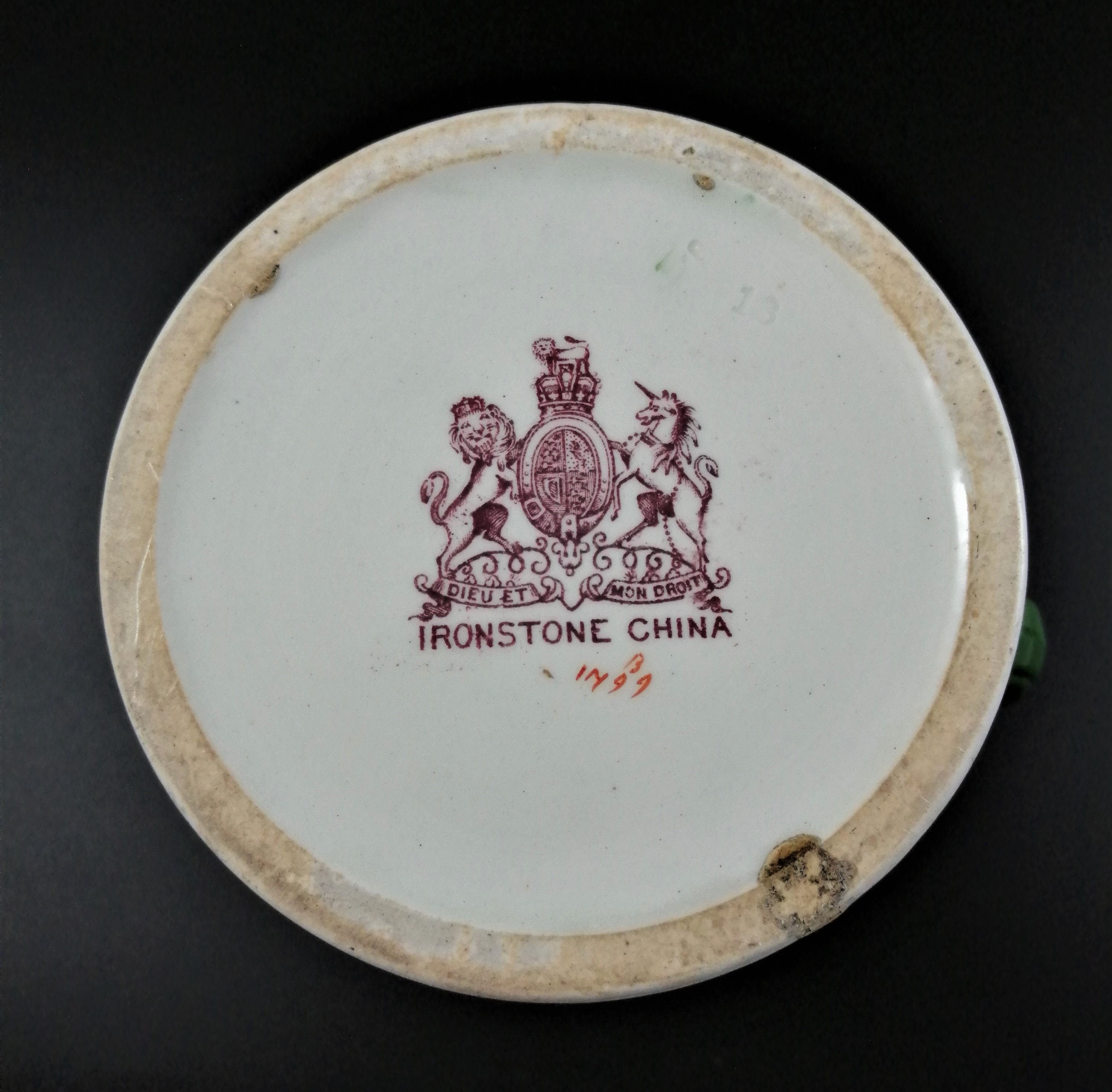 Rare antique Ashworth's Ironstone jug in the "Trophies" pattern
