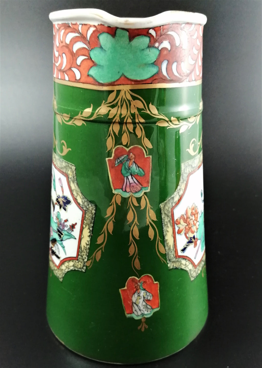 Rare antique Ashworth's Ironstone jug in the "Trophies" pattern