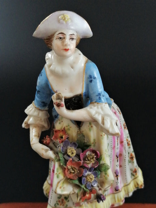 Antique Bavarian porcelain figurine of lady with flowers, Lenck Family, 1840’s