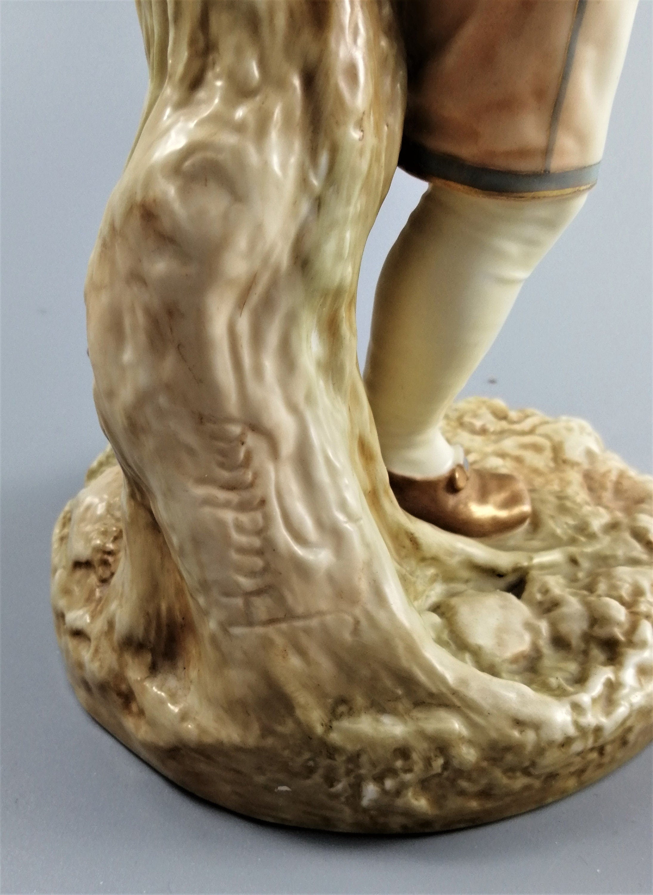 Antique Royal Worcester,boy with basket,modelled by James Hadley.