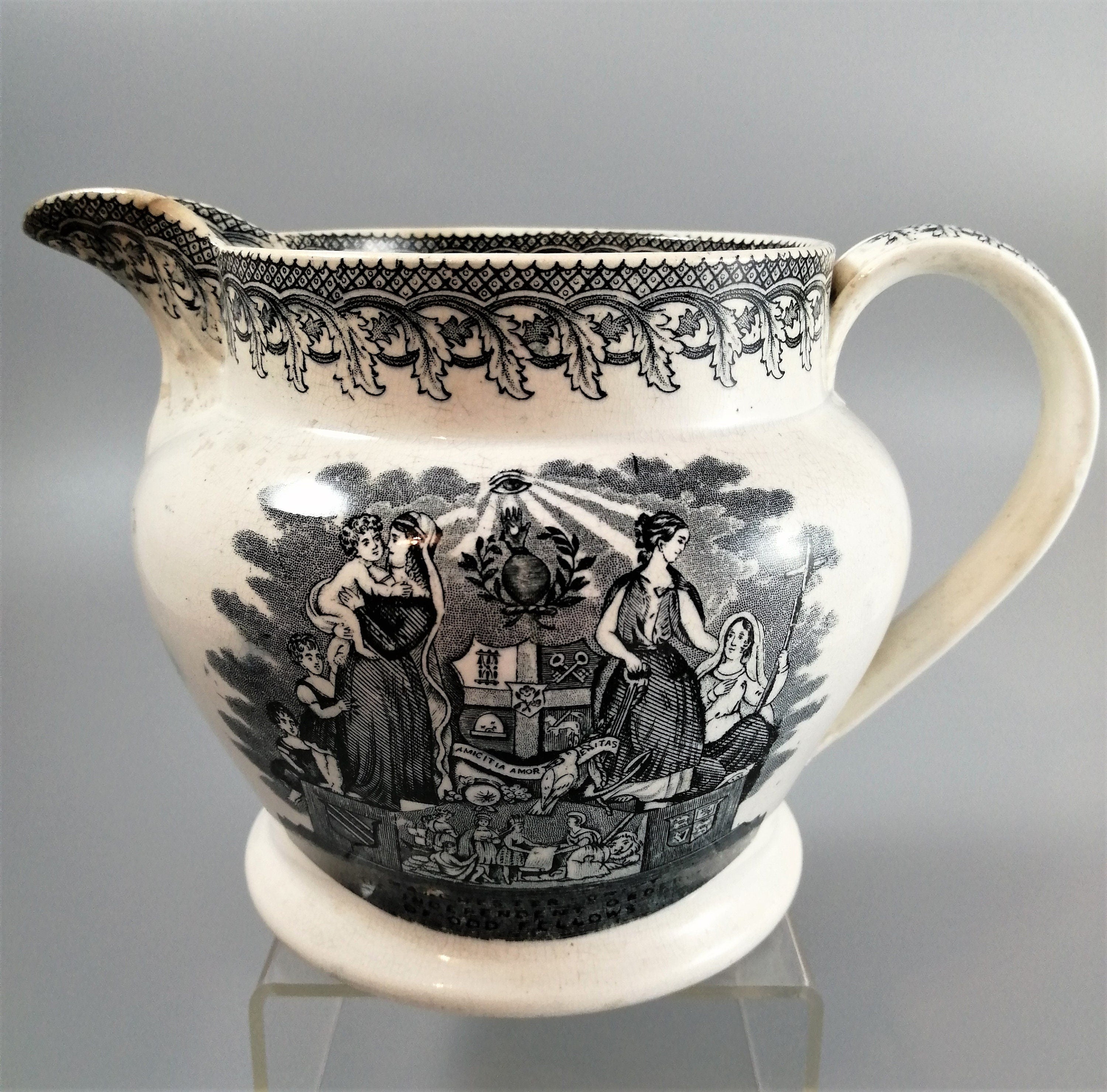 Antique jug with Masonic designs, Independent Order of Odd Fellows Fraternity.