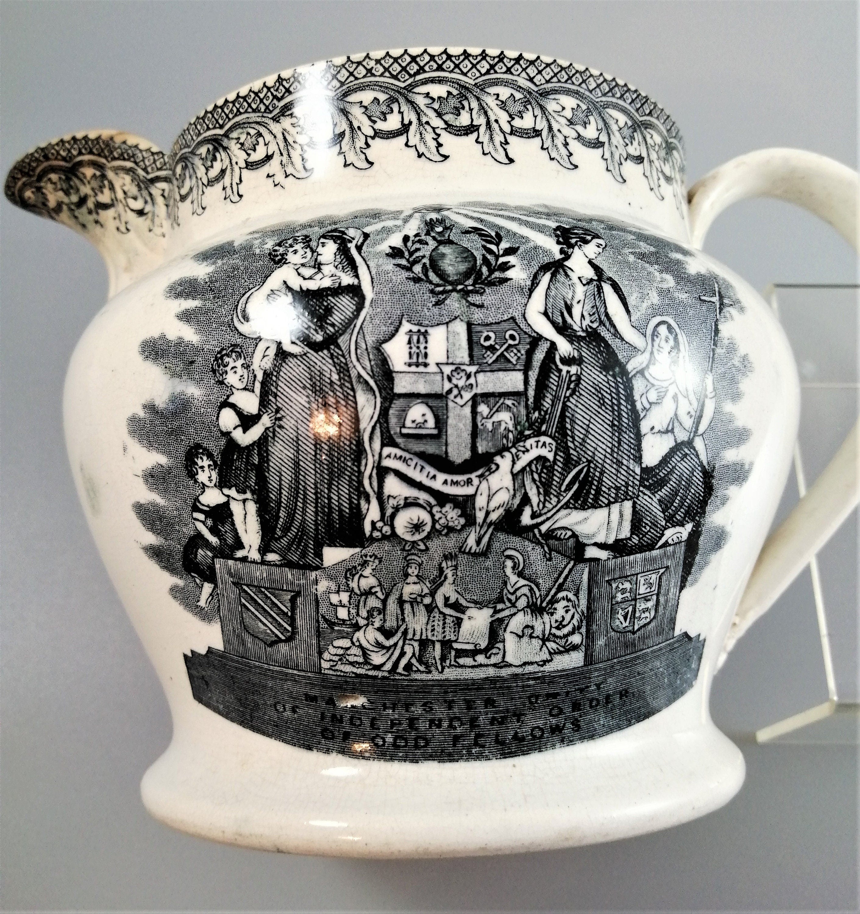 Antique jug with Masonic designs, Independent Order of Odd Fellows Fraternity.