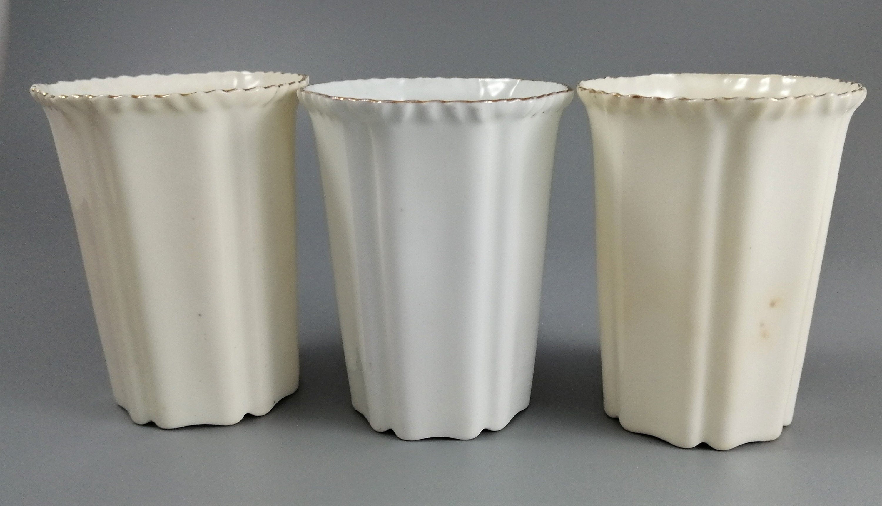 Three antique porcelain beakers, Manchester Unity of the Independent Order of Oddfellows.