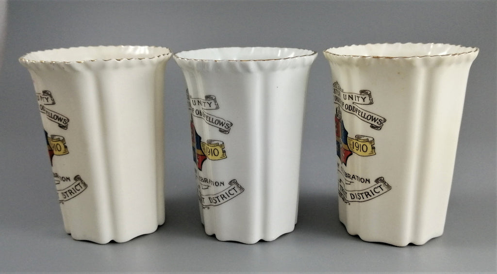 Three antique porcelain beakers, Manchester Unity of the Independent Order of Oddfellows.
