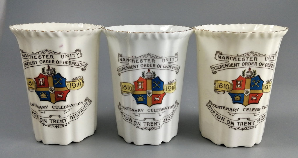 Three antique porcelain beakers, Manchester Unity of the Independent Order of Oddfellows.