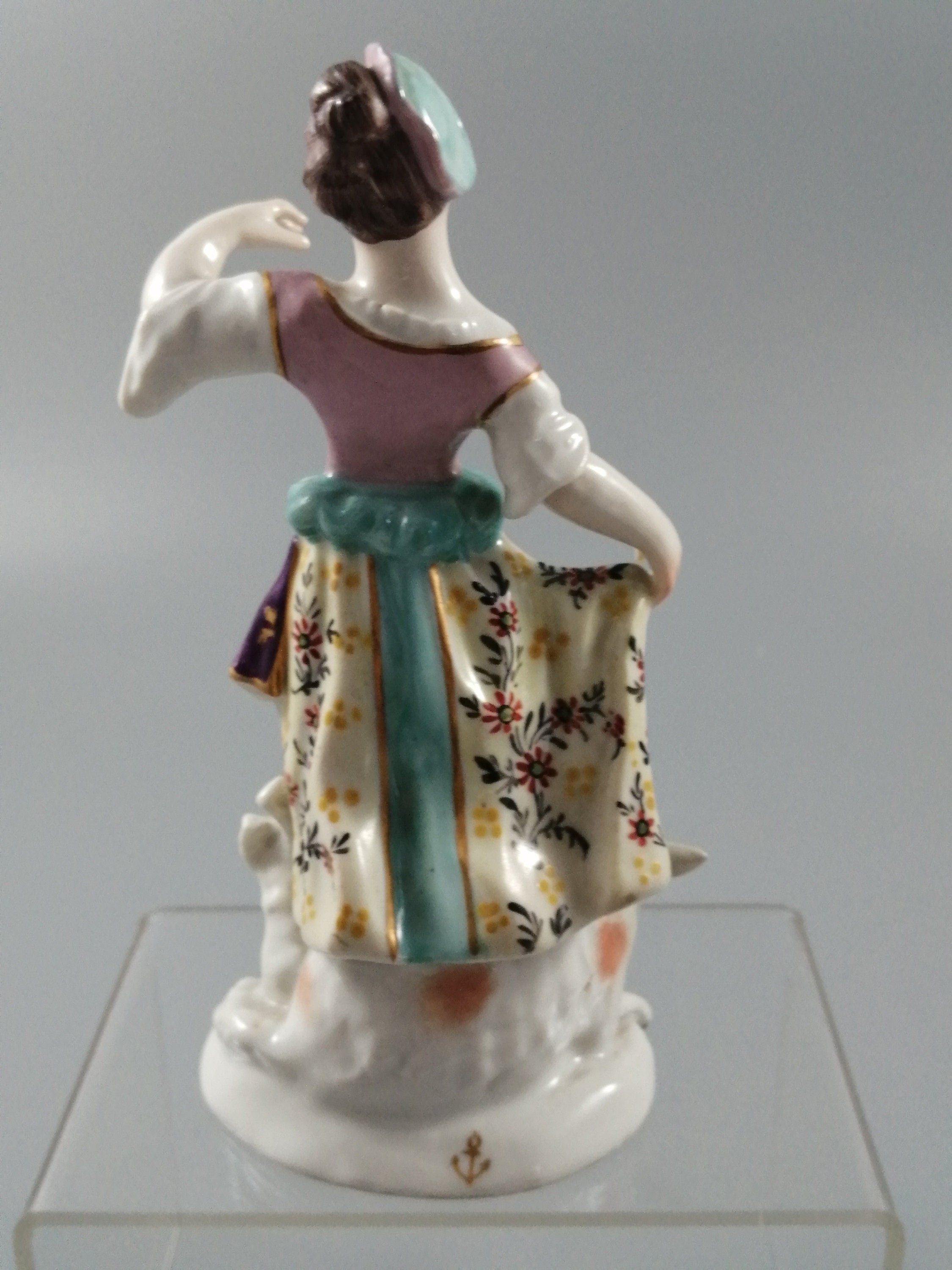 Possibly Chelsea porcelain figurine of young woman shepherdess, gold anchor mark, c. 1820