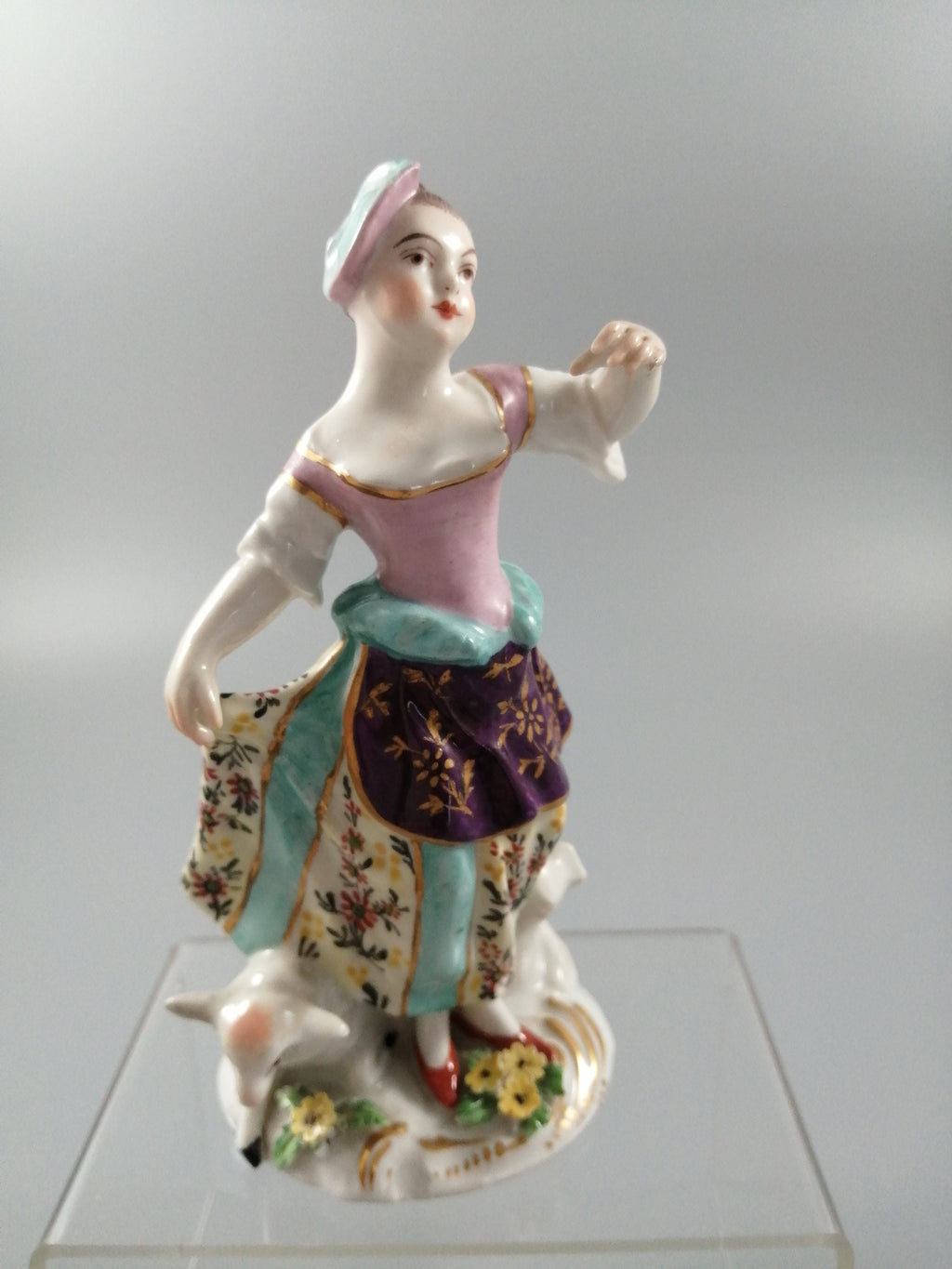 Possibly Chelsea porcelain figurine of young woman shepherdess, gold anchor mark, c. 1820