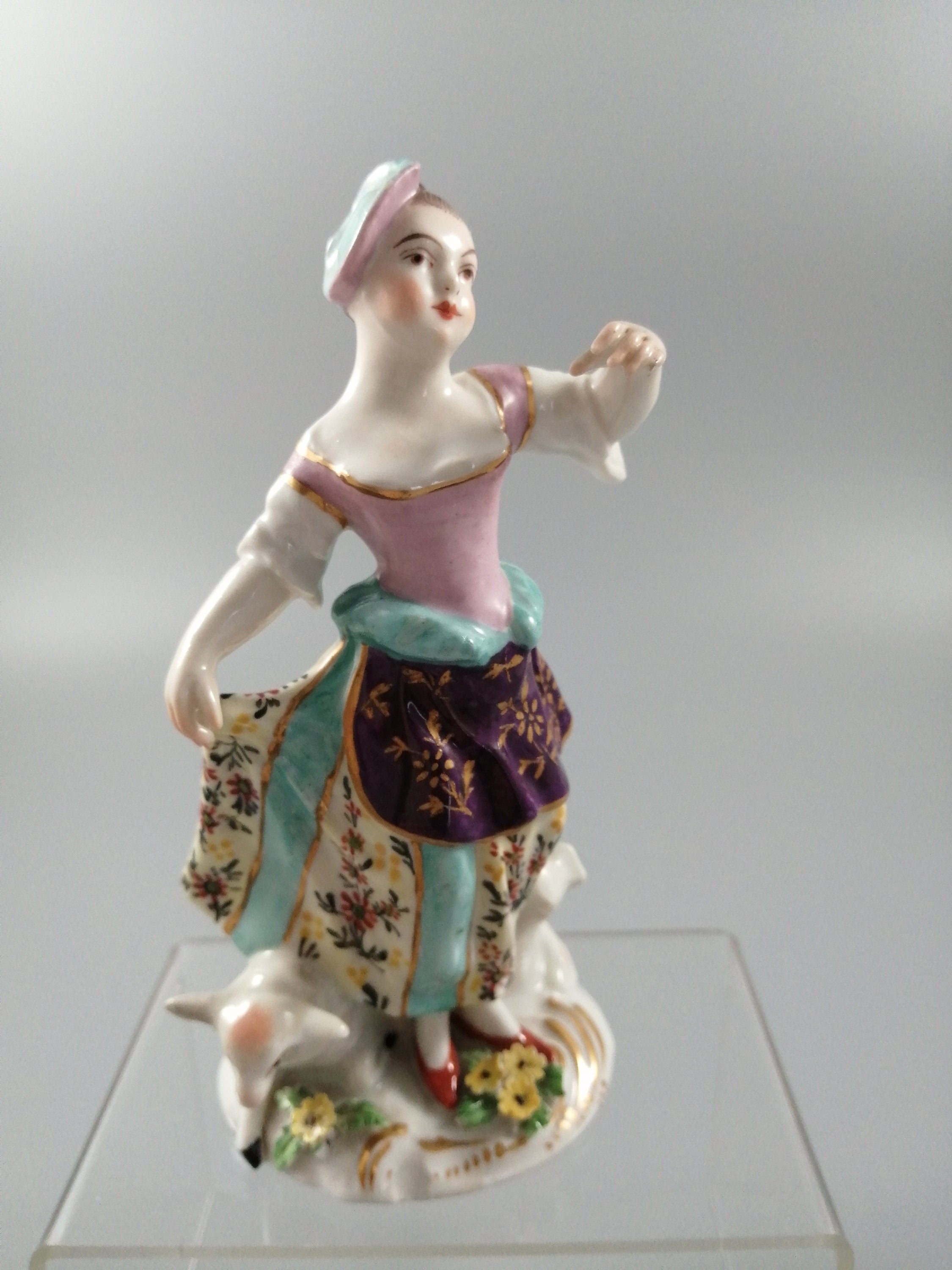 Possibly Chelsea porcelain figurine of young woman shepherdess, gold anchor mark, c. 1820