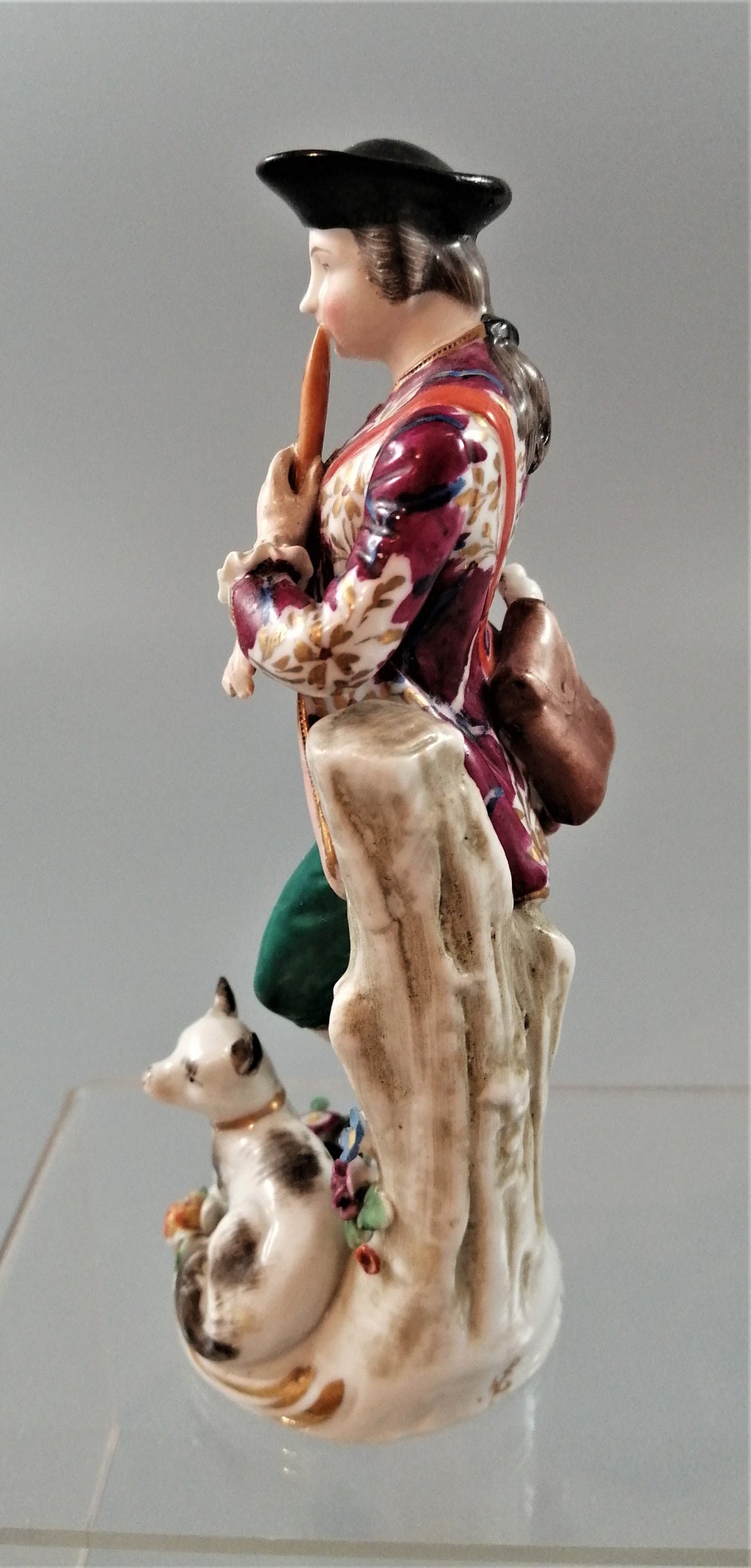 Antique French Porcelain Figurine: Flute Player with Cat, Early 19th Century