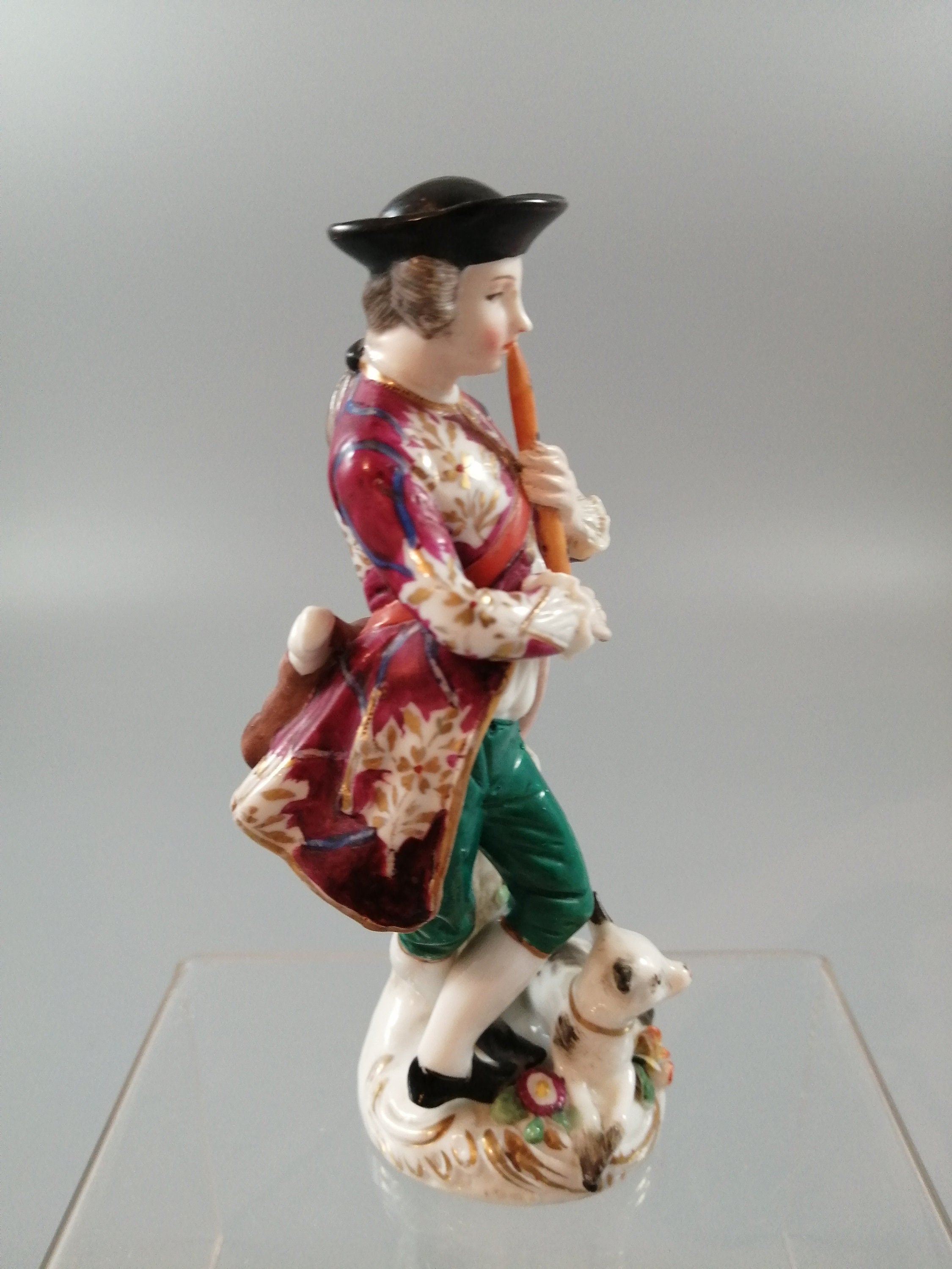 Antique French Porcelain Figurine: Flute Player with Cat, Early 19th Century
