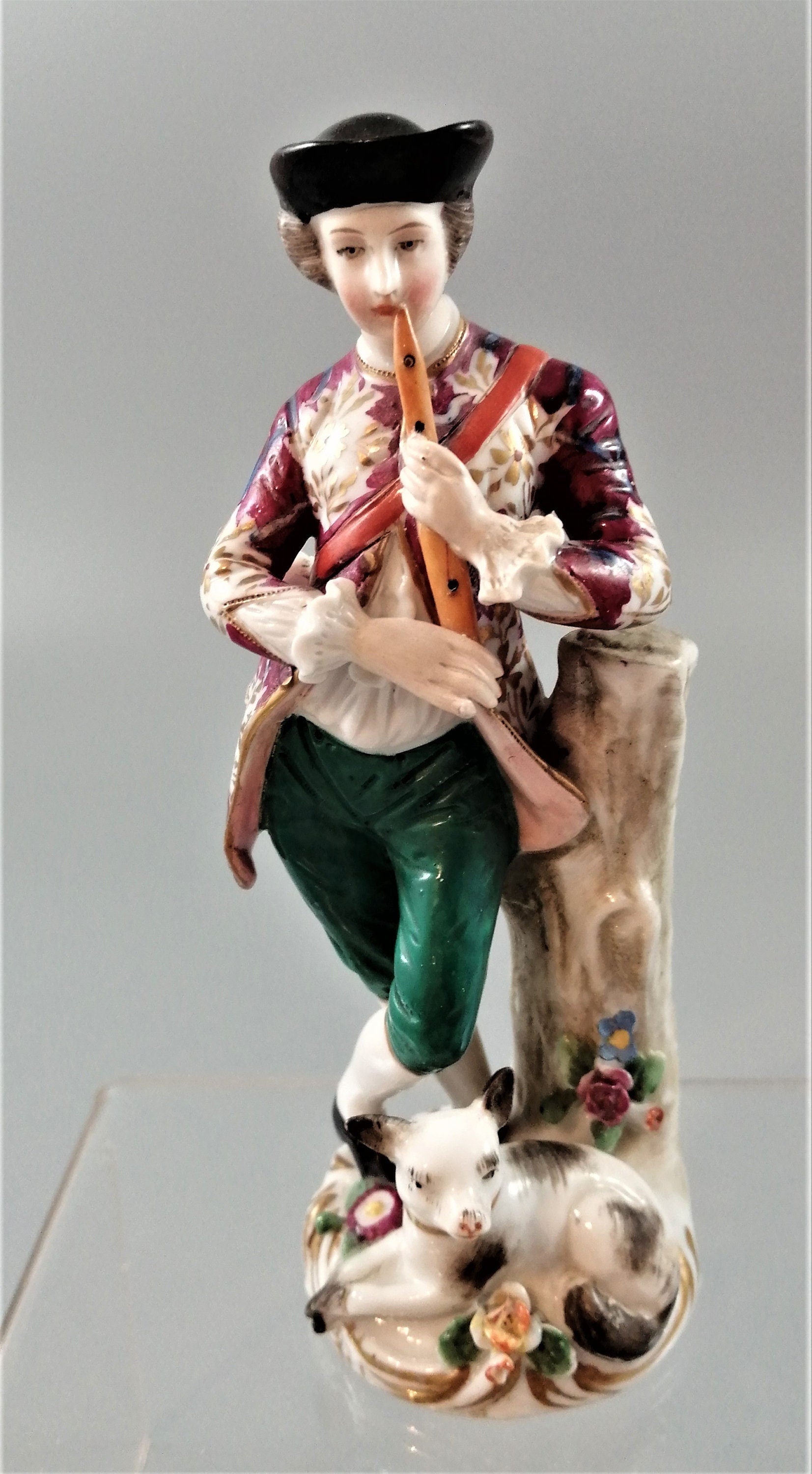 Antique French Porcelain Figurine: Flute Player with Cat, Early 19th Century