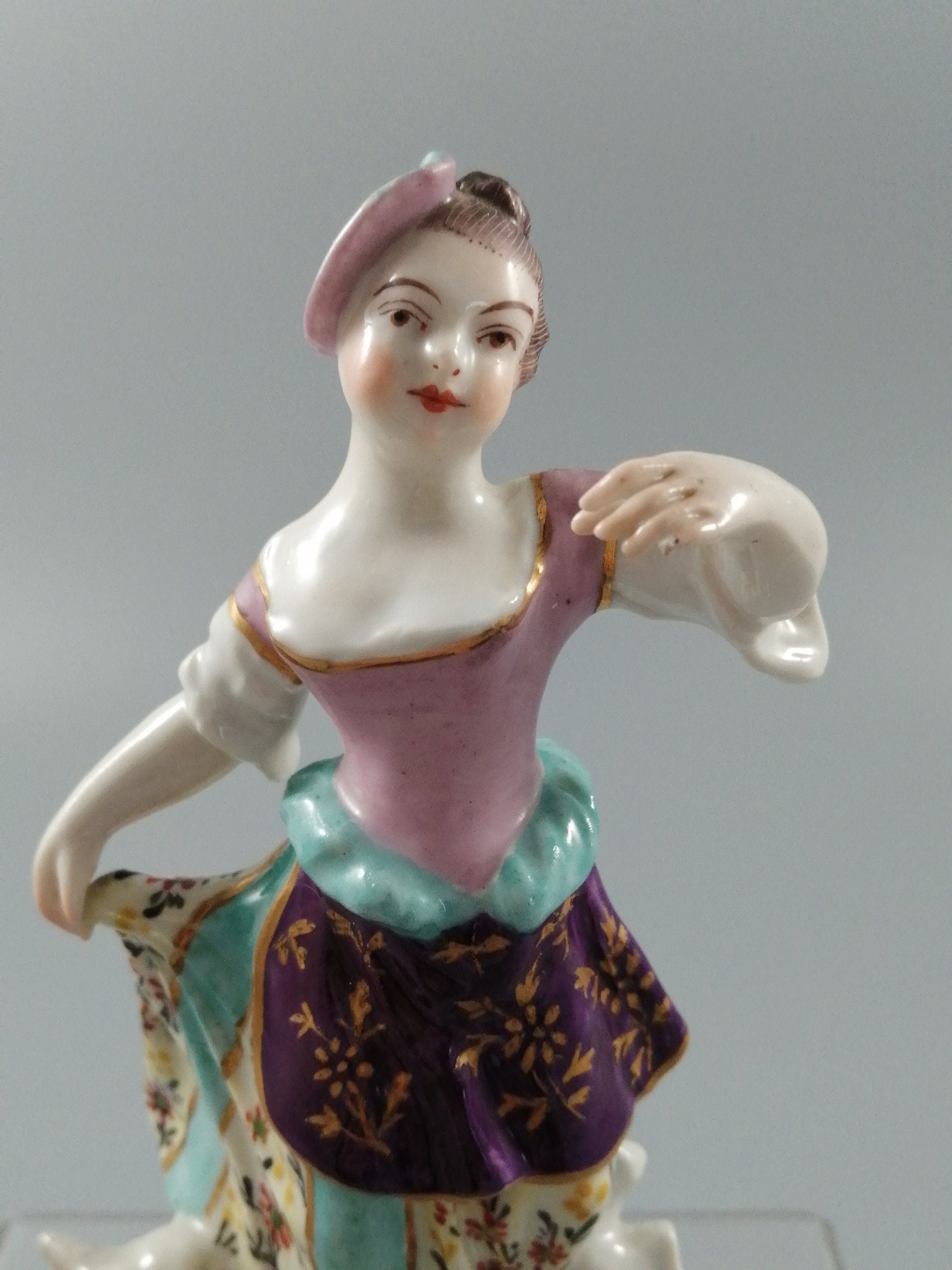 Possibly Chelsea porcelain figurine of young woman shepherdess, gold anchor mark, c. 1820
