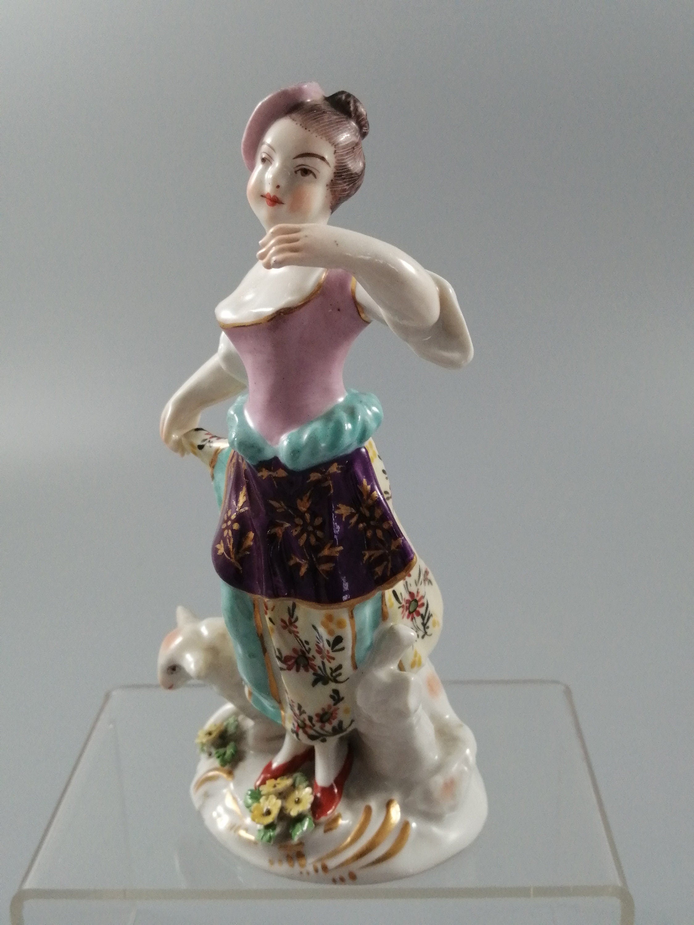Possibly Chelsea porcelain figurine of young woman shepherdess, gold anchor mark, c. 1820