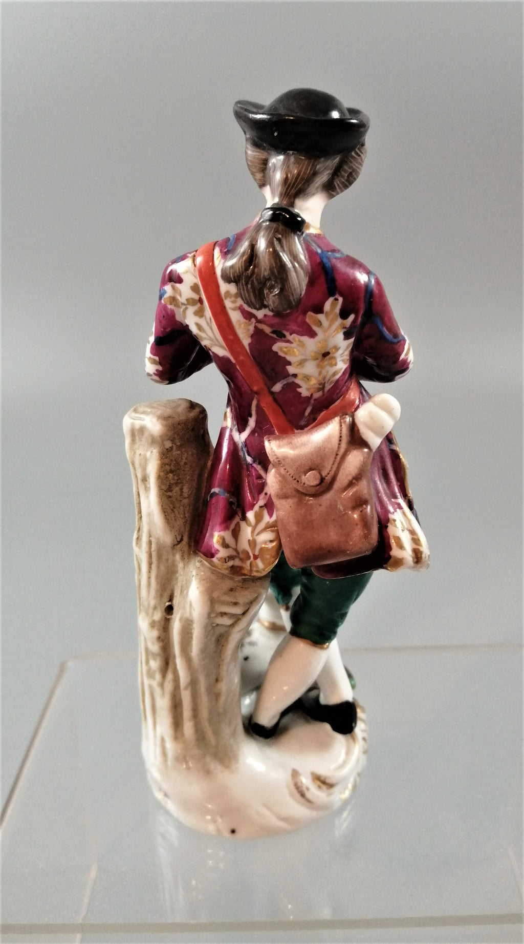 Antique French Porcelain Figurine: Flute Player with Cat, Early 19th Century