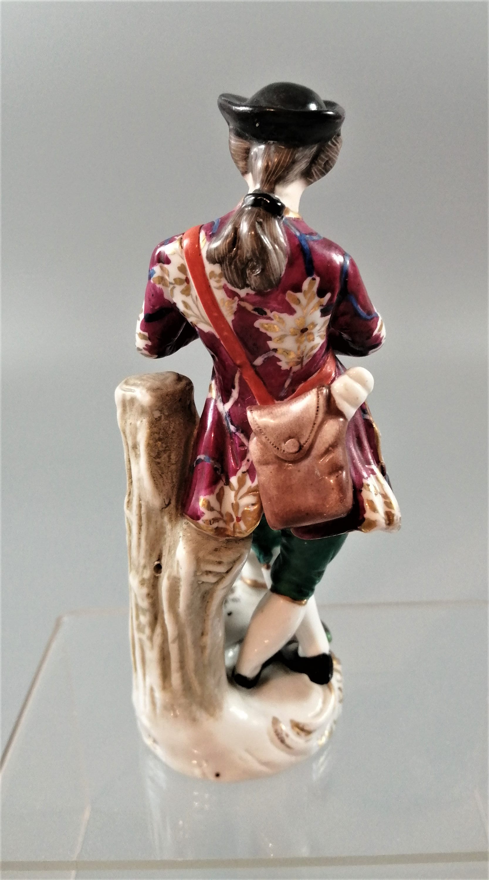 Antique French Porcelain Figurine: Flute Player with Cat, Early 19th Century