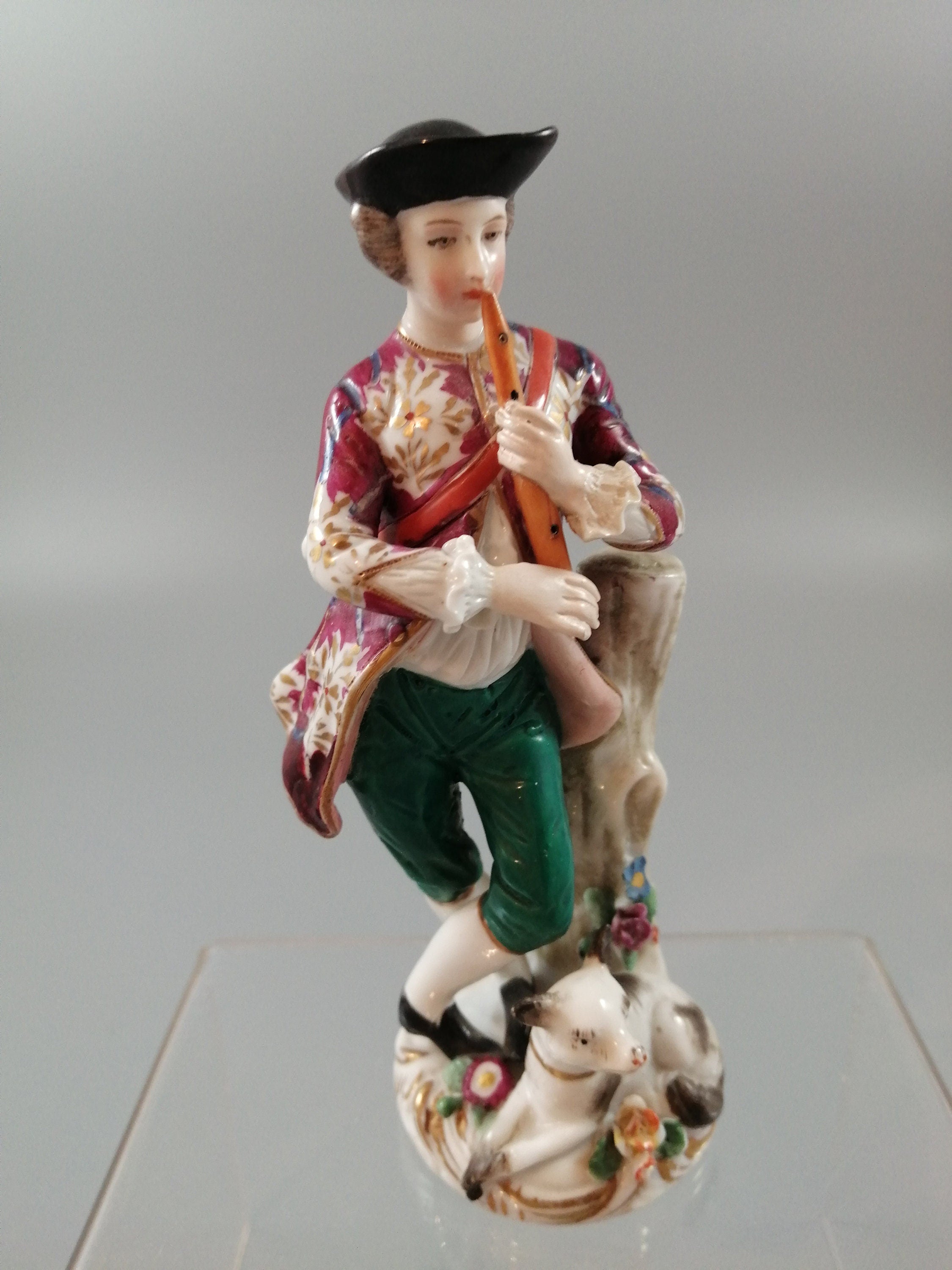 Antique French Porcelain Figurine: Flute Player with Cat, Early 19th Century