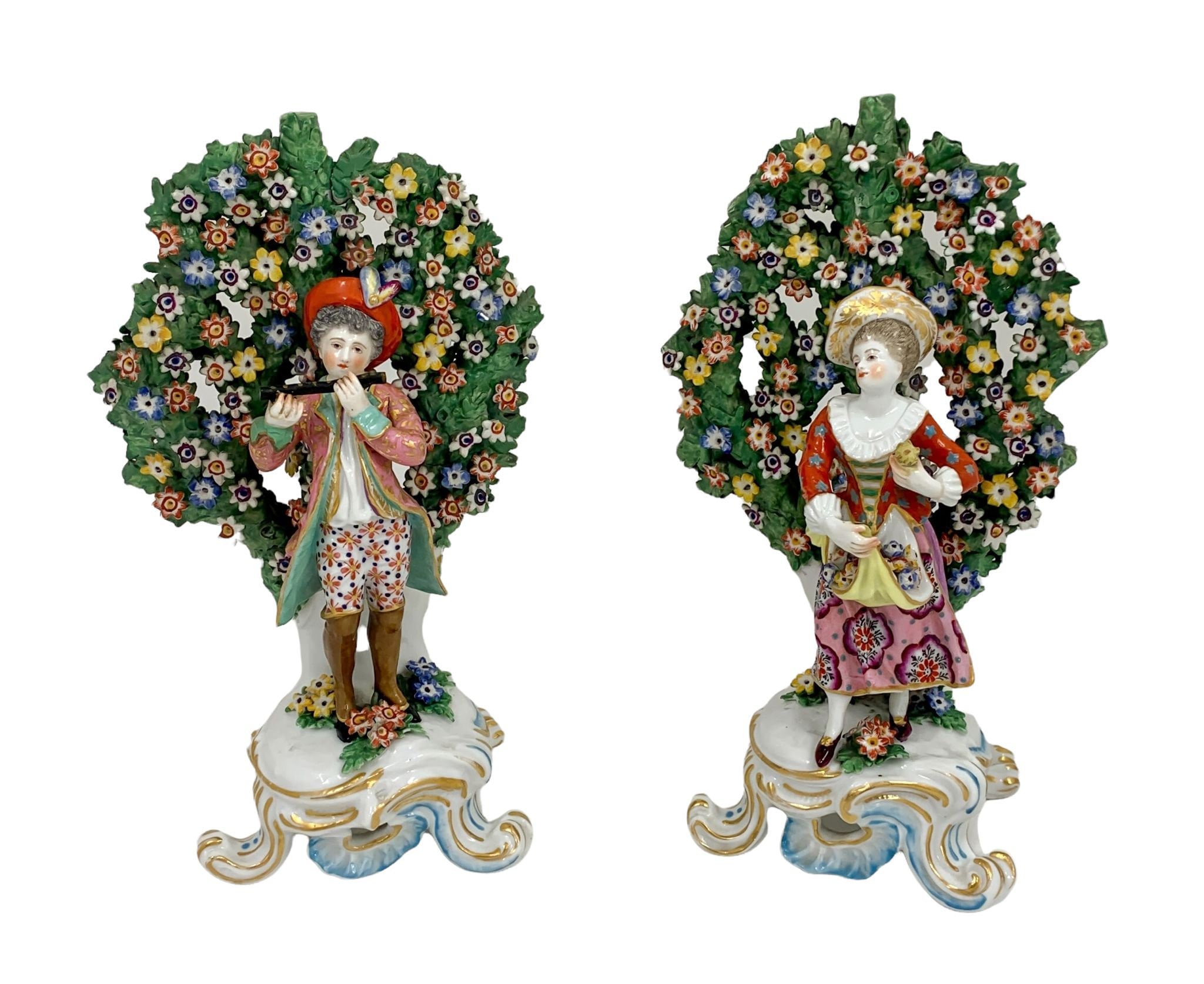 A pair of 18th century Chelsea – Derby bocage porcelain figurines.