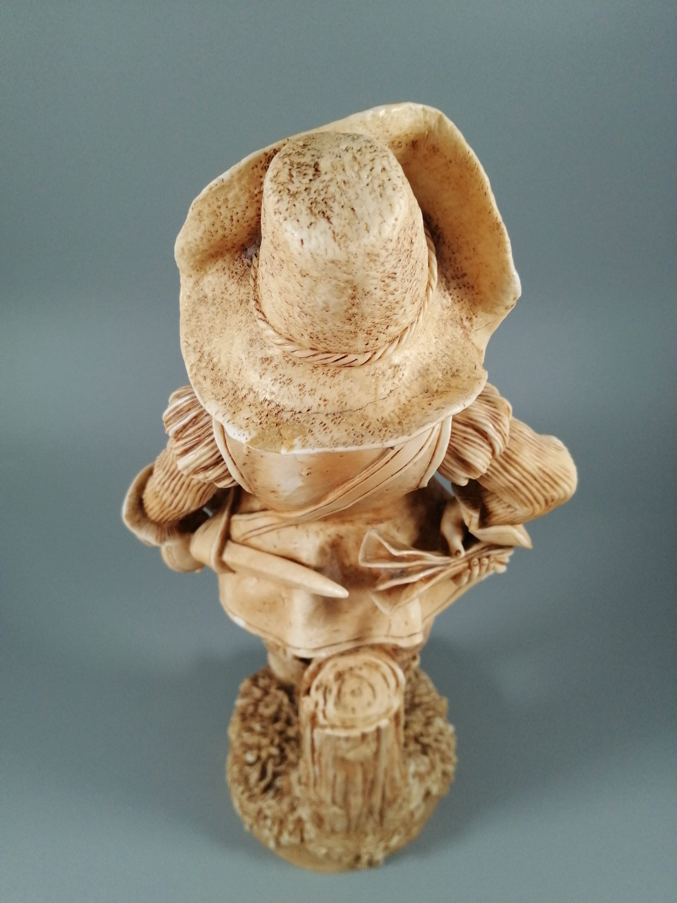 A Robinson and Leadbeater ivory parian ware figure of a musketeer