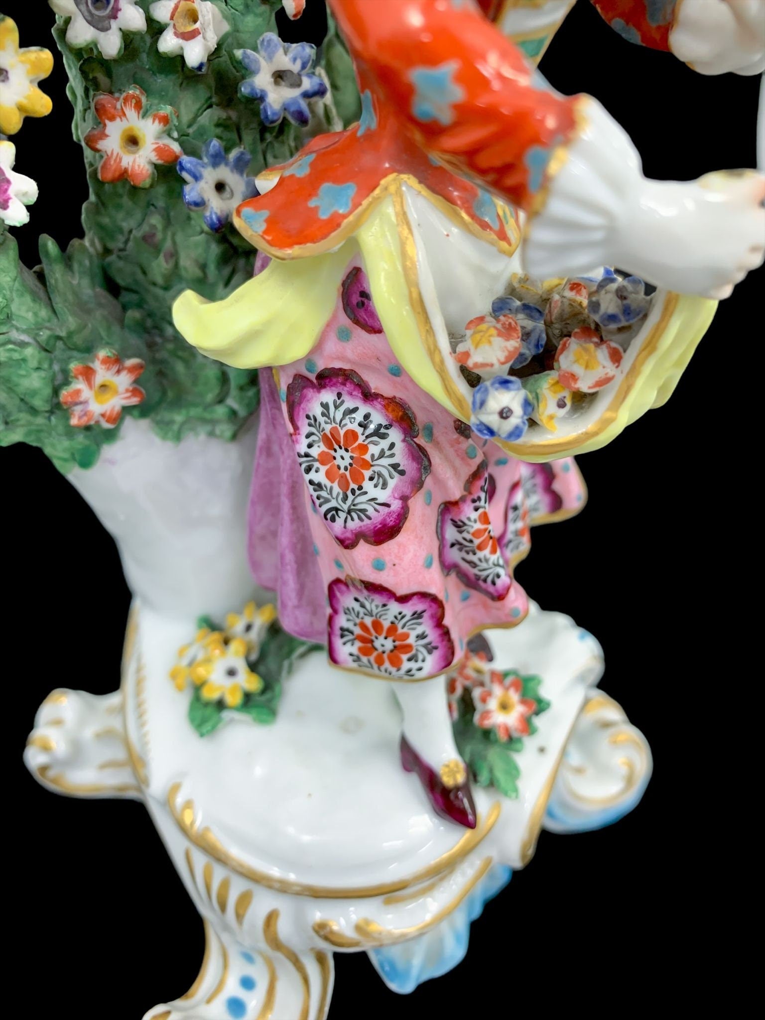 A pair of 18th century Chelsea – Derby bocage porcelain figurines.