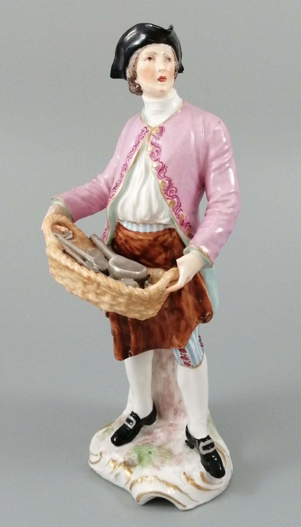 Antique Chelsea porcelain figurine, “A Spoon Seller”, c. 1758 - 1769