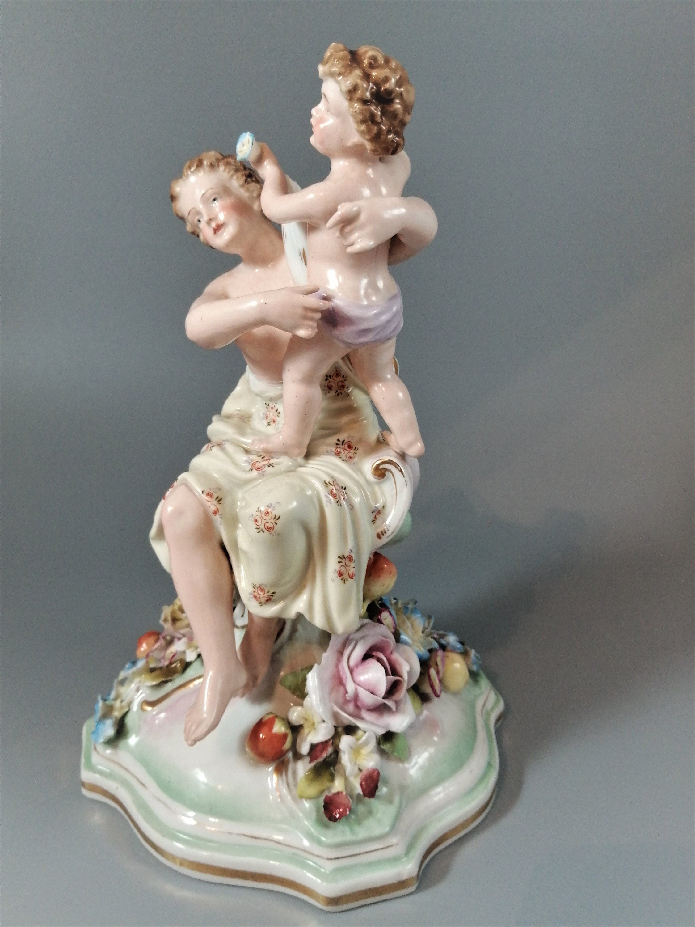 Antique porcelain figure Schierholtz Woman with Cherub, c. 1880