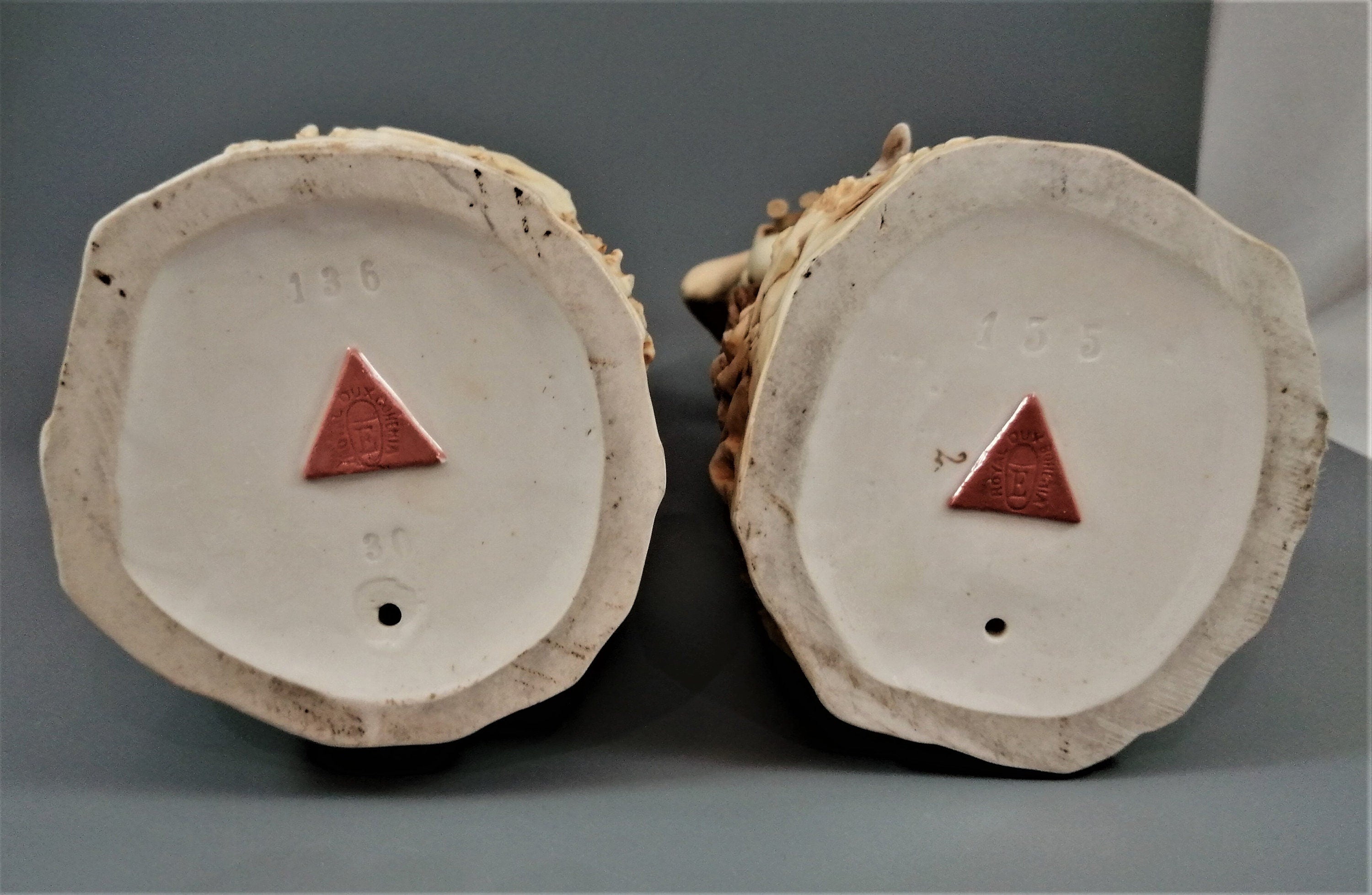 A pair of shepherd and shepherdess statuettes made of Royal Dux porcelain