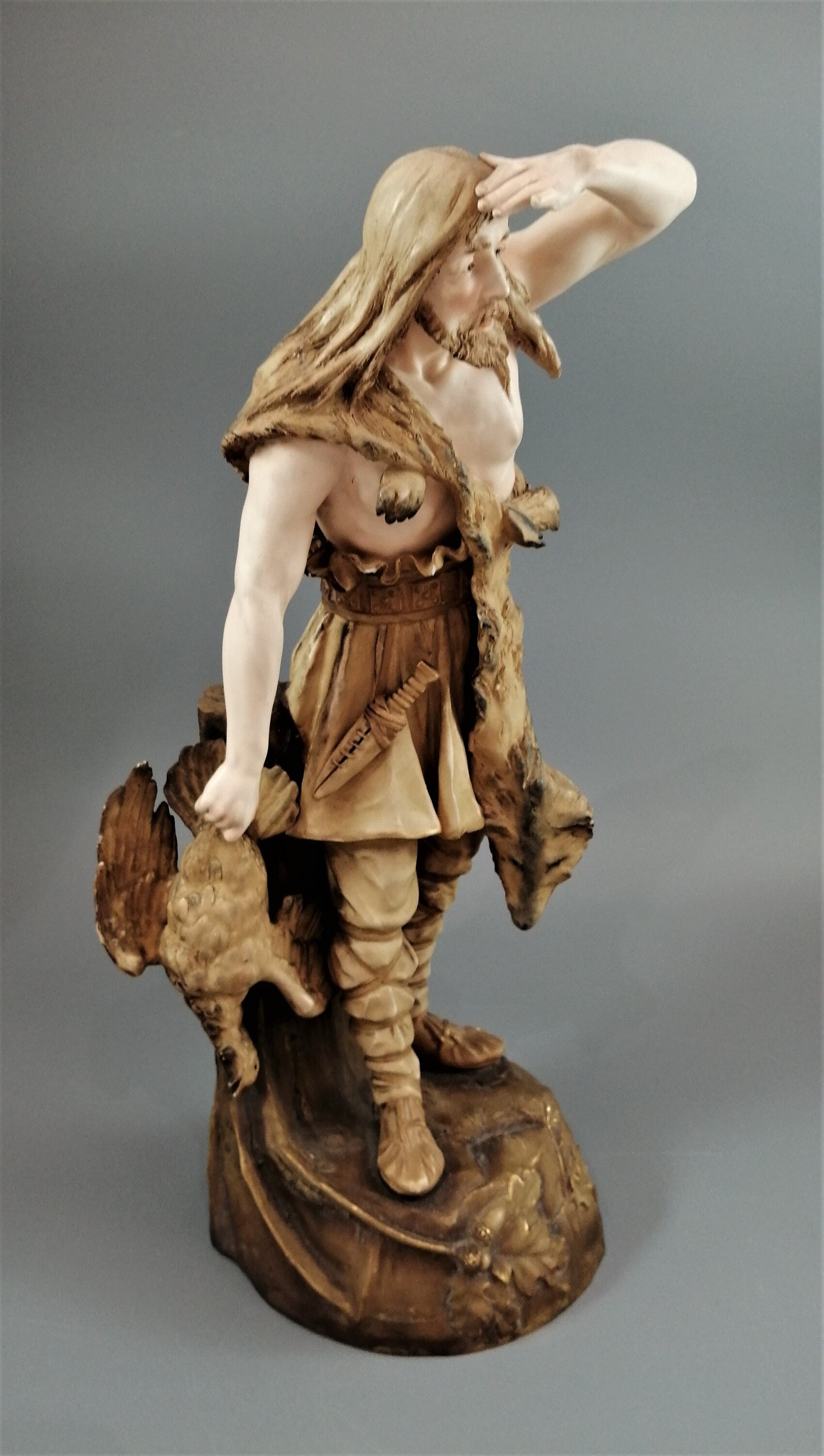 Rare Ernst Wahliss Porcelain Sculpture: Art Nouveau Hunter in Wolfskin