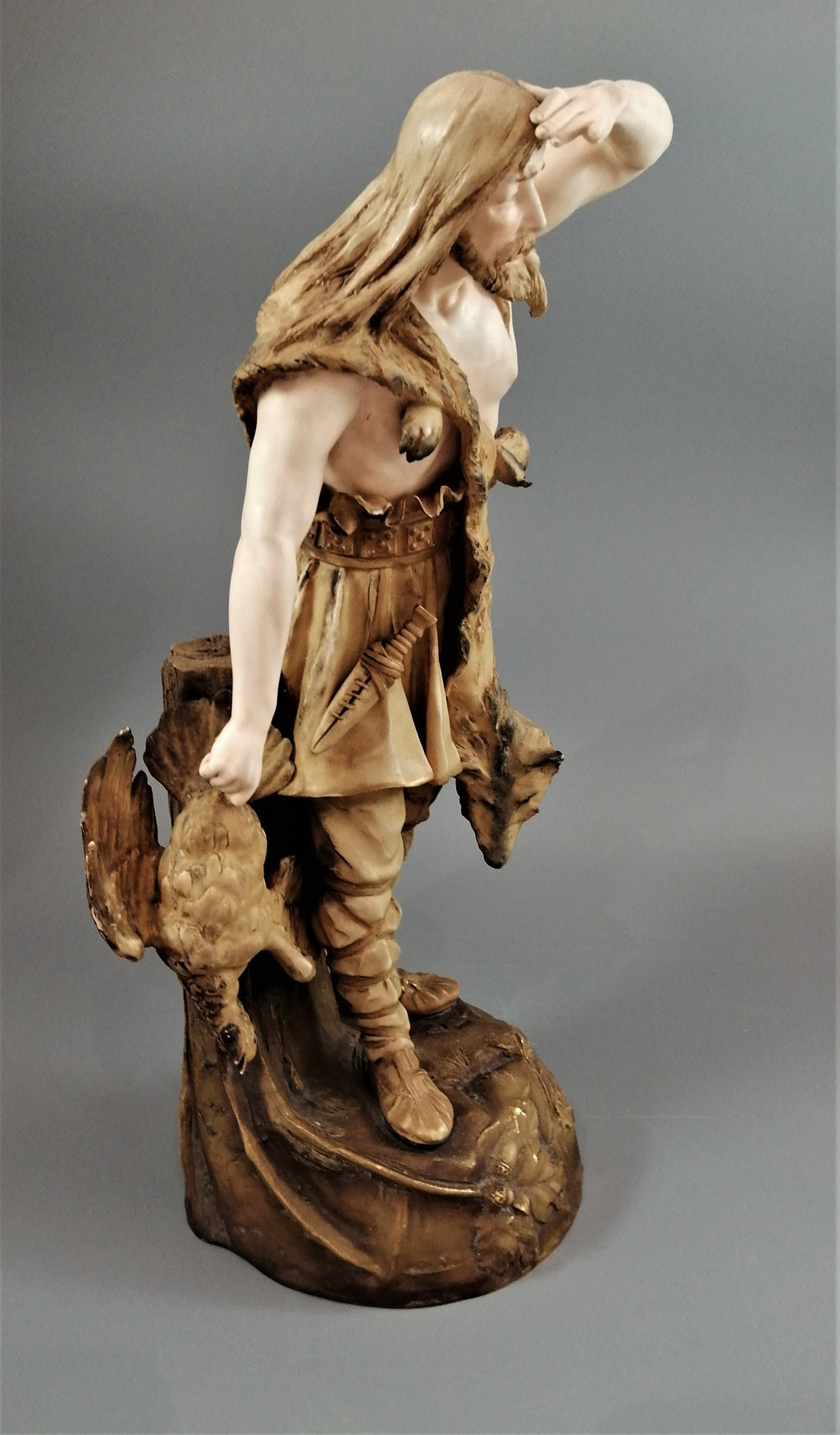 Rare Ernst Wahliss Porcelain Sculpture: Art Nouveau Hunter in Wolfskin