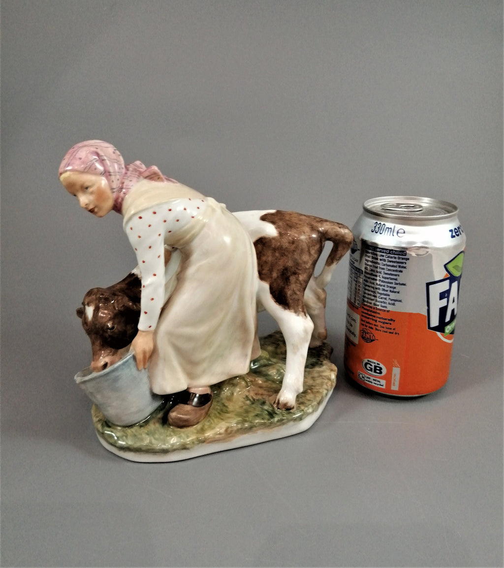 Royal Copenhagen Porcelain Figurine: Girl with Calf, Juliane Marie Polychrome