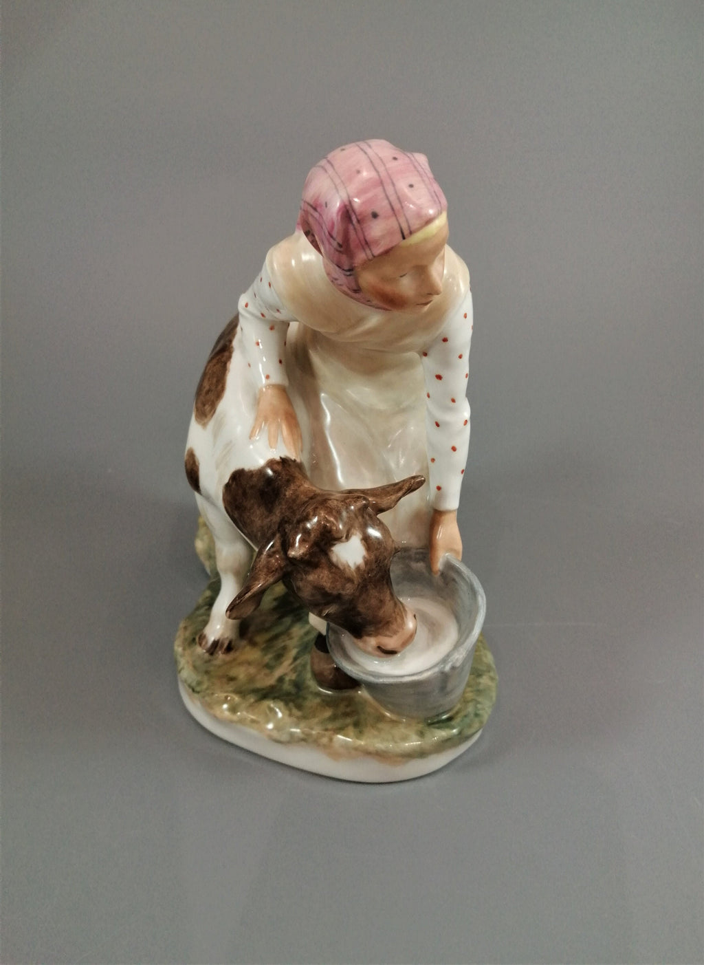 Royal Copenhagen Porcelain Figurine: Girl with Calf, Juliane Marie Polychrome