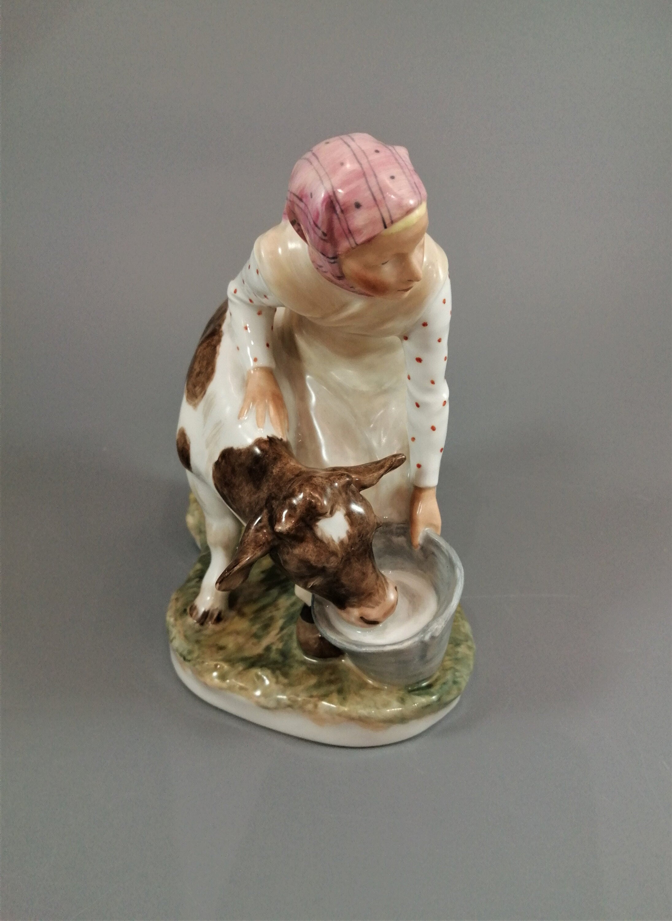 Royal Copenhagen Porcelain Figurine: Girl with Calf, Juliane Marie Polychrome