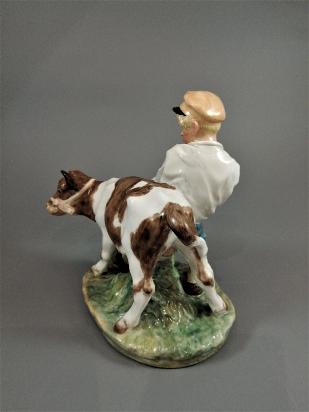 Royal Copenhagen Porcelain Figurine: Boy with Calf, Juliane Marie Design