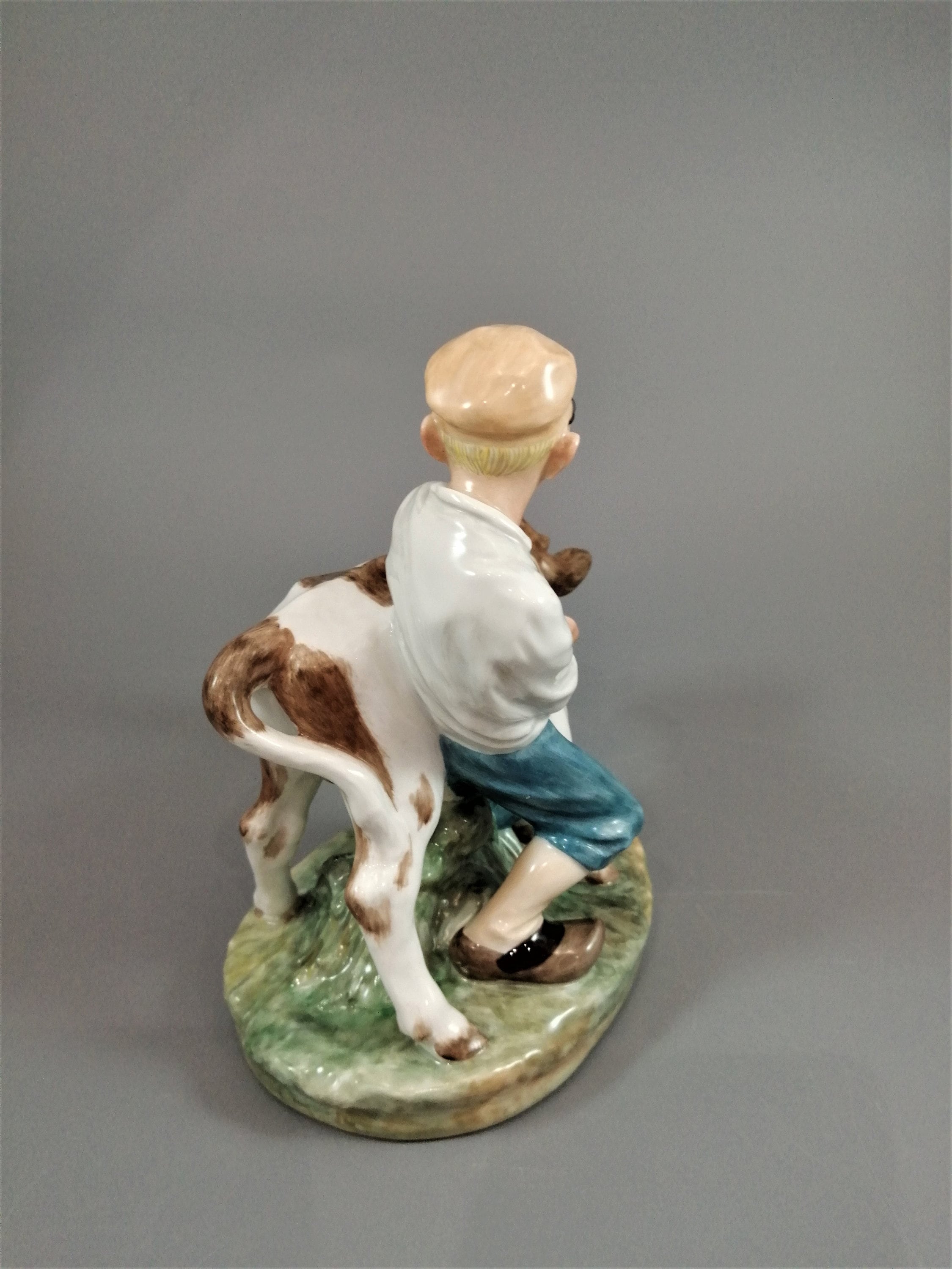 Royal Copenhagen Porcelain Figurine: Boy with Calf, Juliane Marie Design