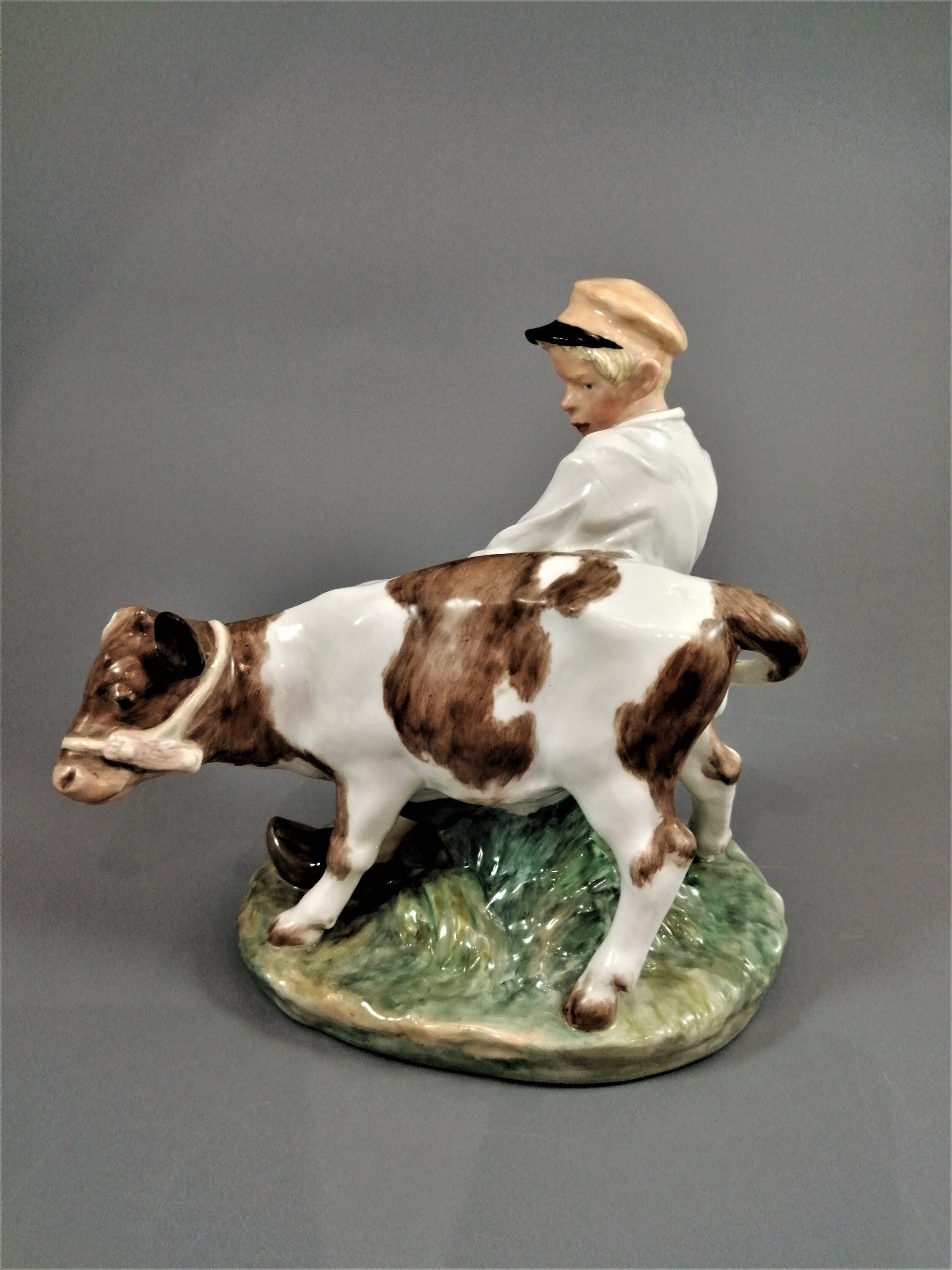 Royal Copenhagen Porcelain Figurine: Boy with Calf, Juliane Marie Design
