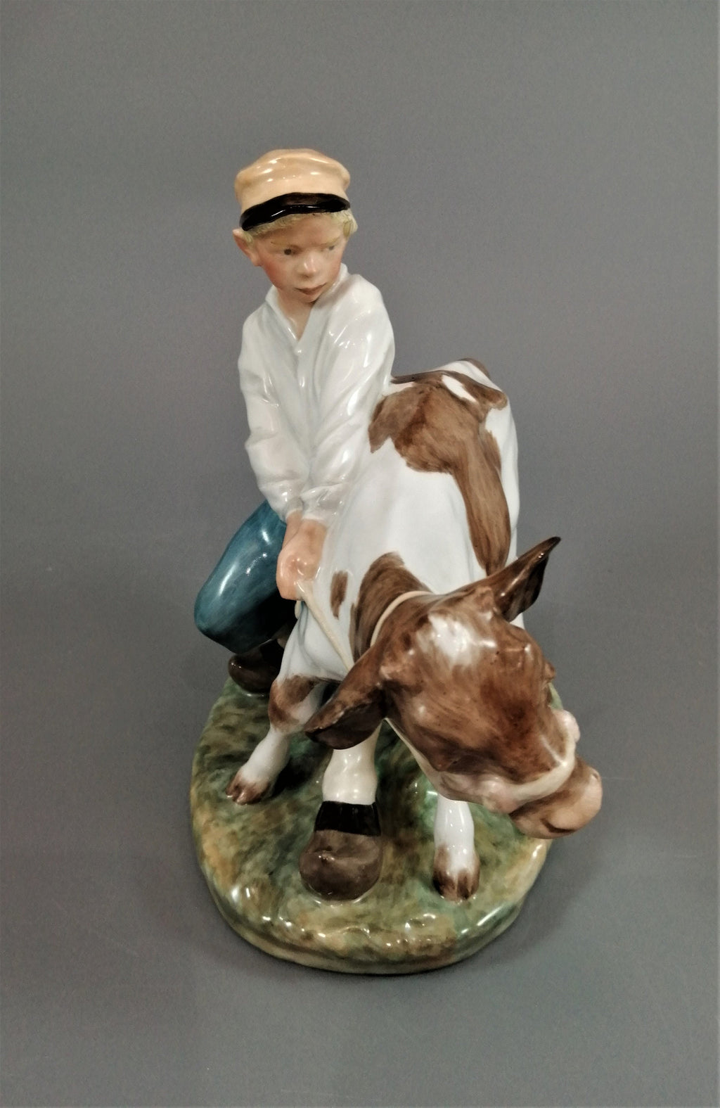 Royal Copenhagen Porcelain Figurine: Boy with Calf, Juliane Marie Design