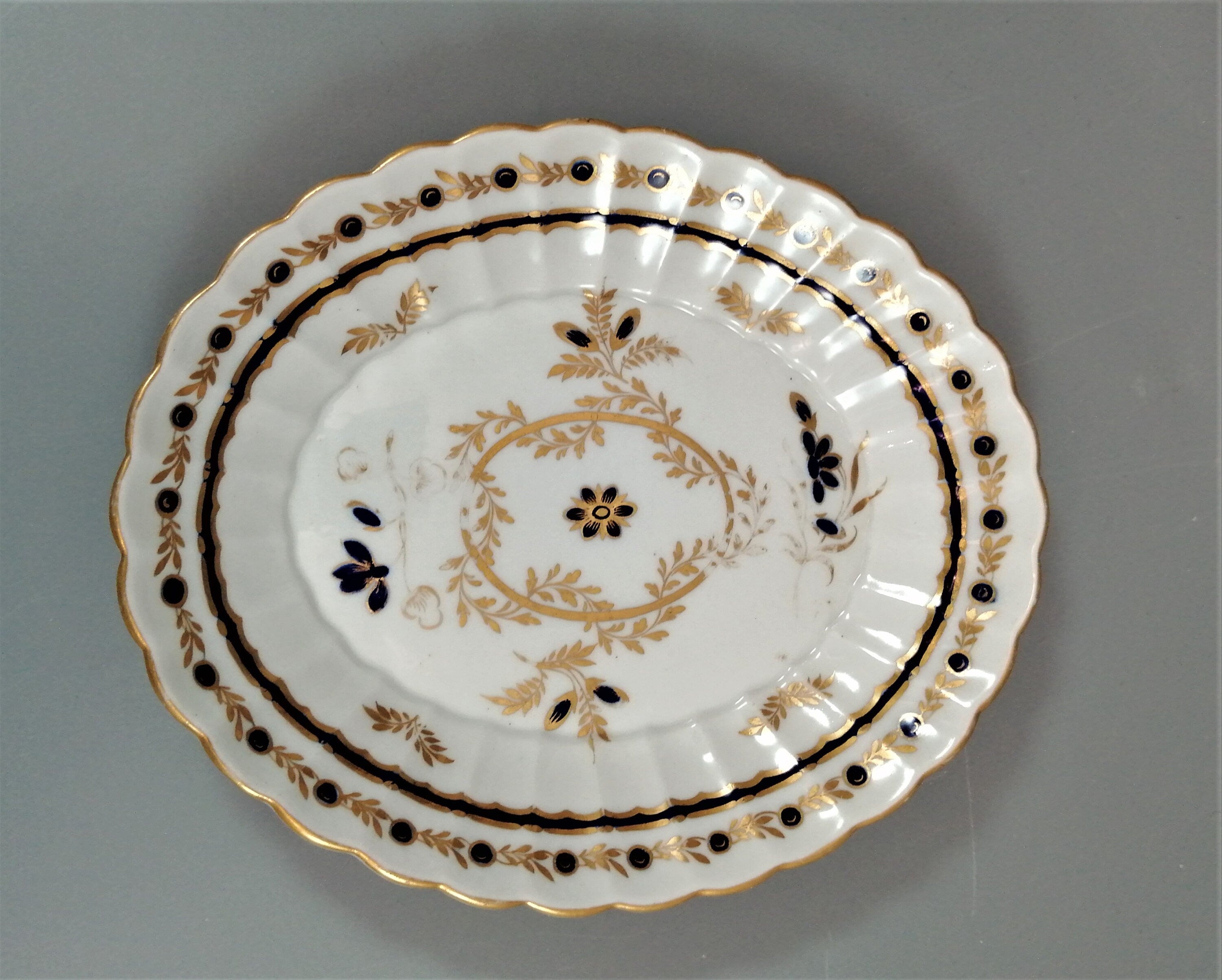 Flight & Barr Worcester barrel-shaped teapot and stand, gold and blue floral design, incised 'M' mark, antique English porcelain, c. 1792