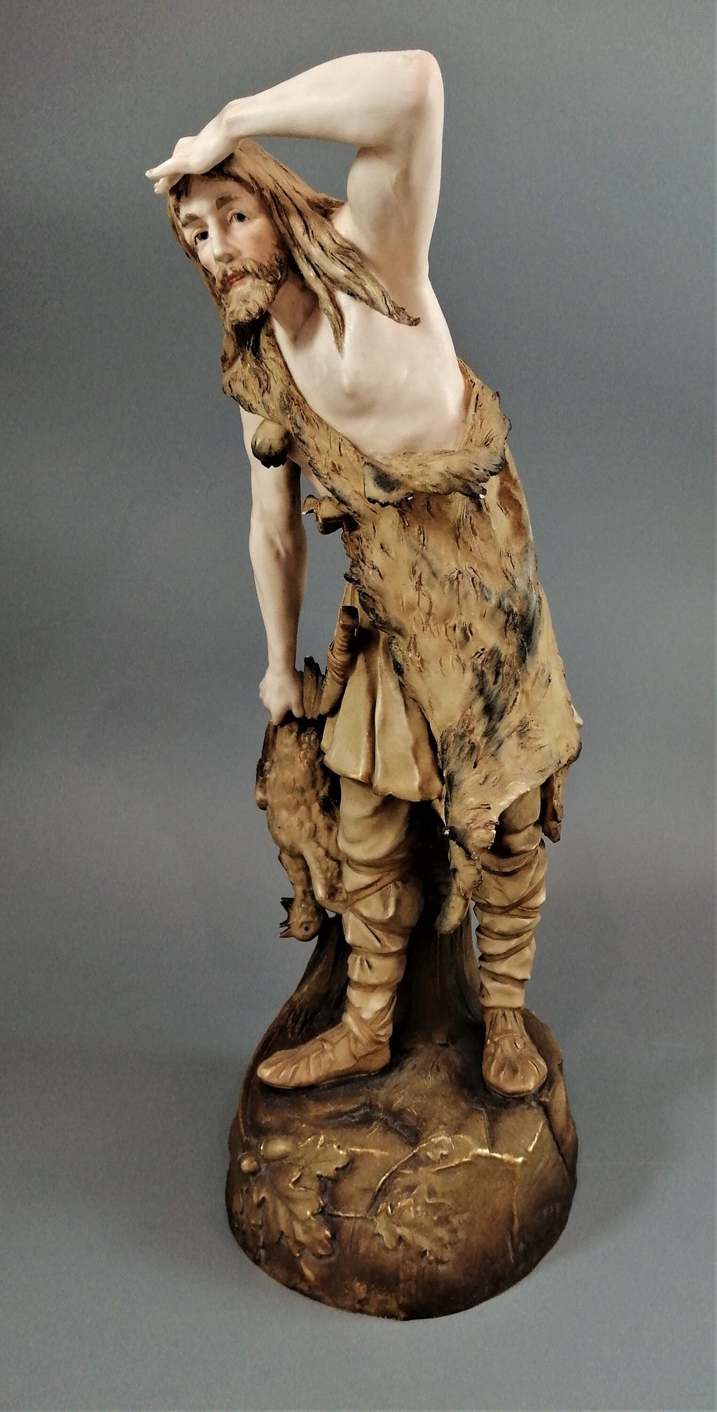Rare Ernst Wahliss Porcelain Sculpture: Art Nouveau Hunter in Wolfskin