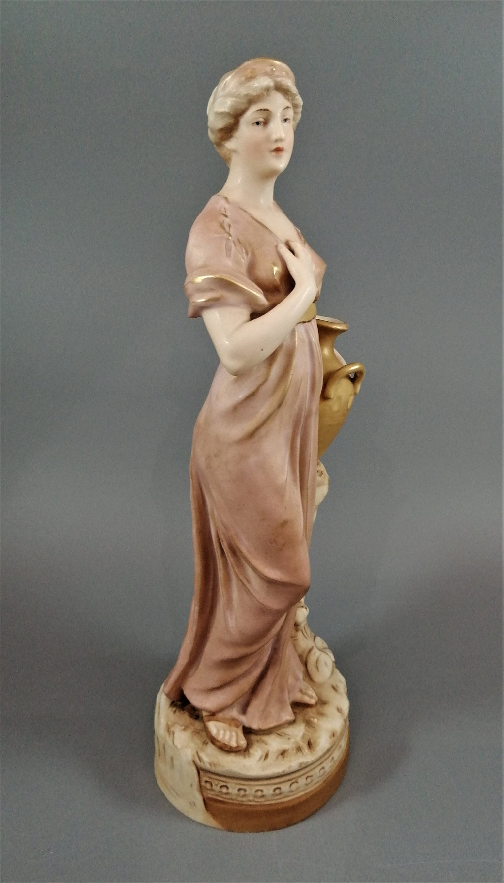 Antique Royal Dux Porcelain Figurine: Lady with Jug