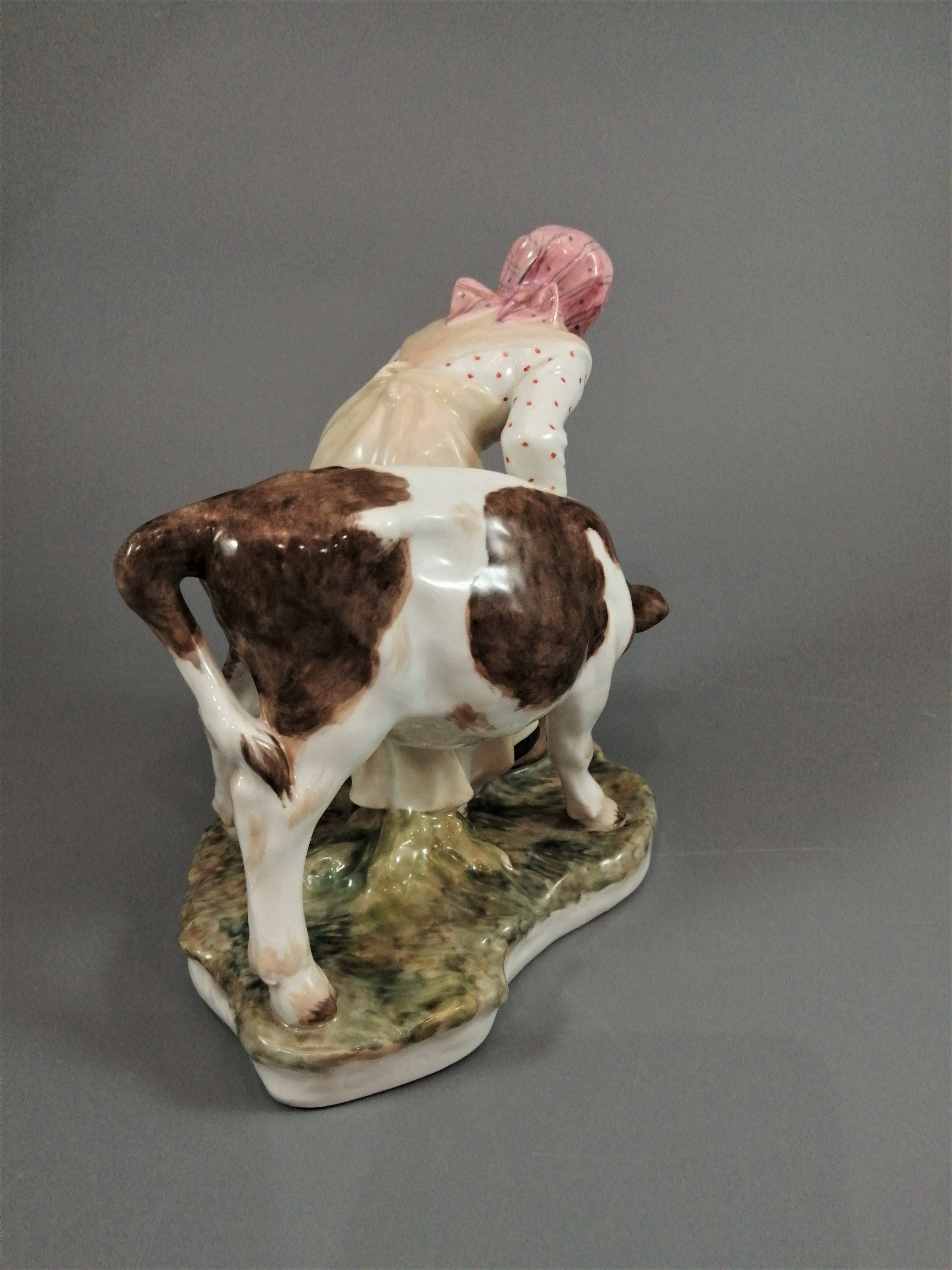 Royal Copenhagen Porcelain Figurine: Girl with Calf, Juliane Marie Polychrome