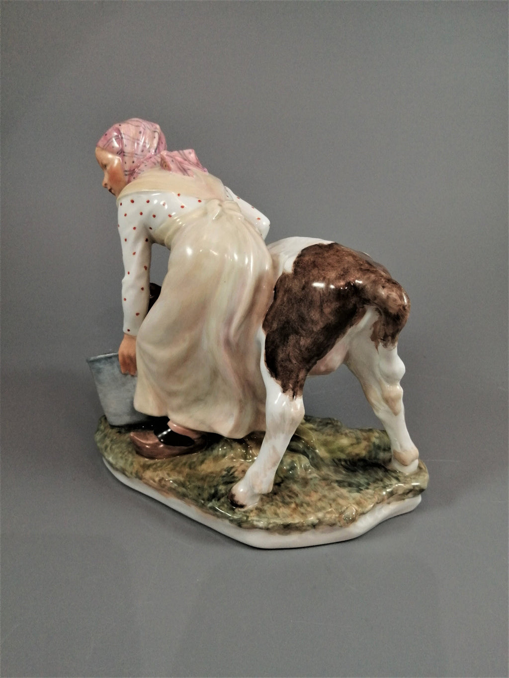 Royal Copenhagen Porcelain Figurine: Girl with Calf, Juliane Marie Polychrome